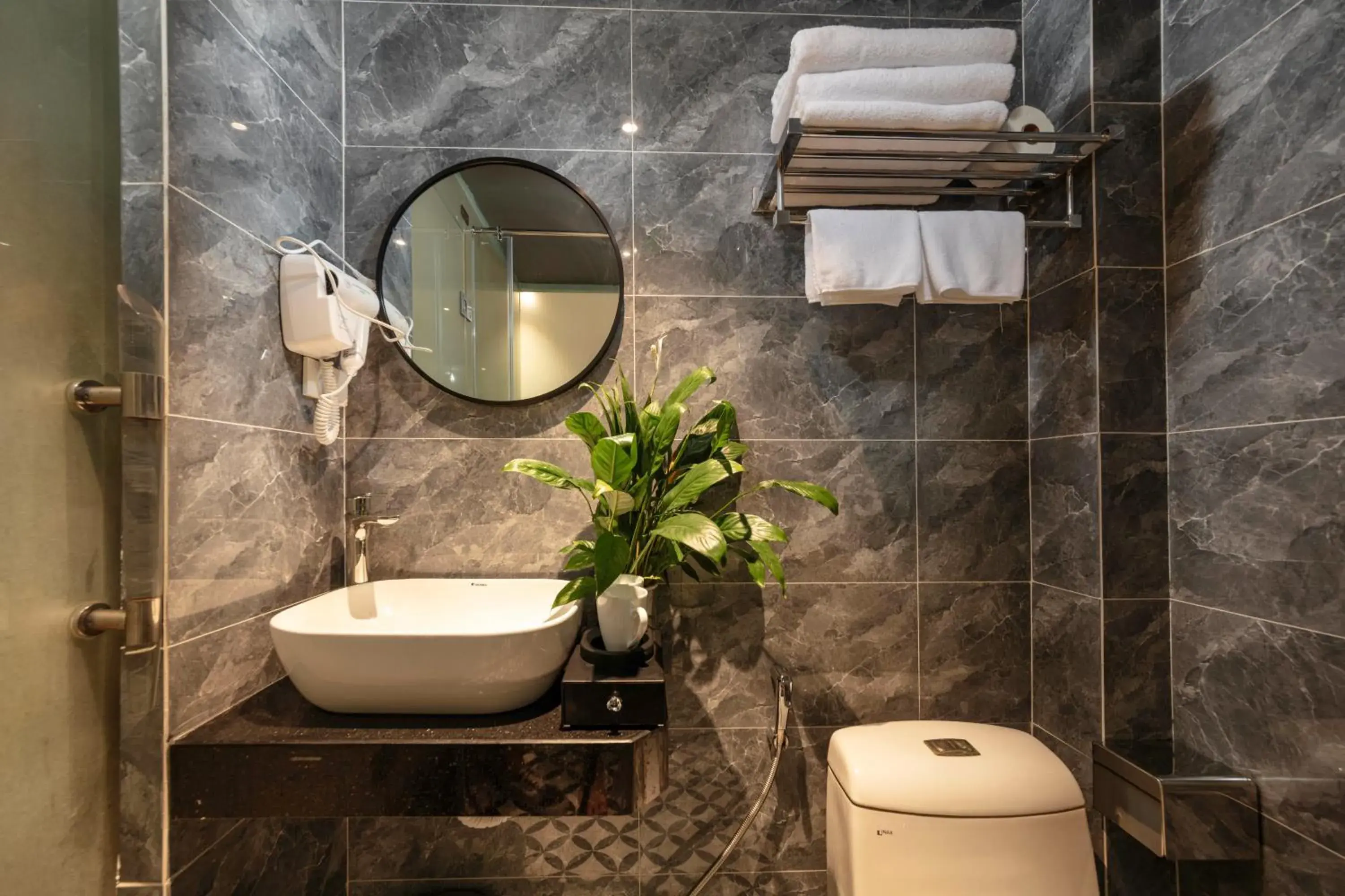 Bathroom in Madelise Stardust Hotel & Travel Bathroom in Madelise Stardust Hotel & Travel