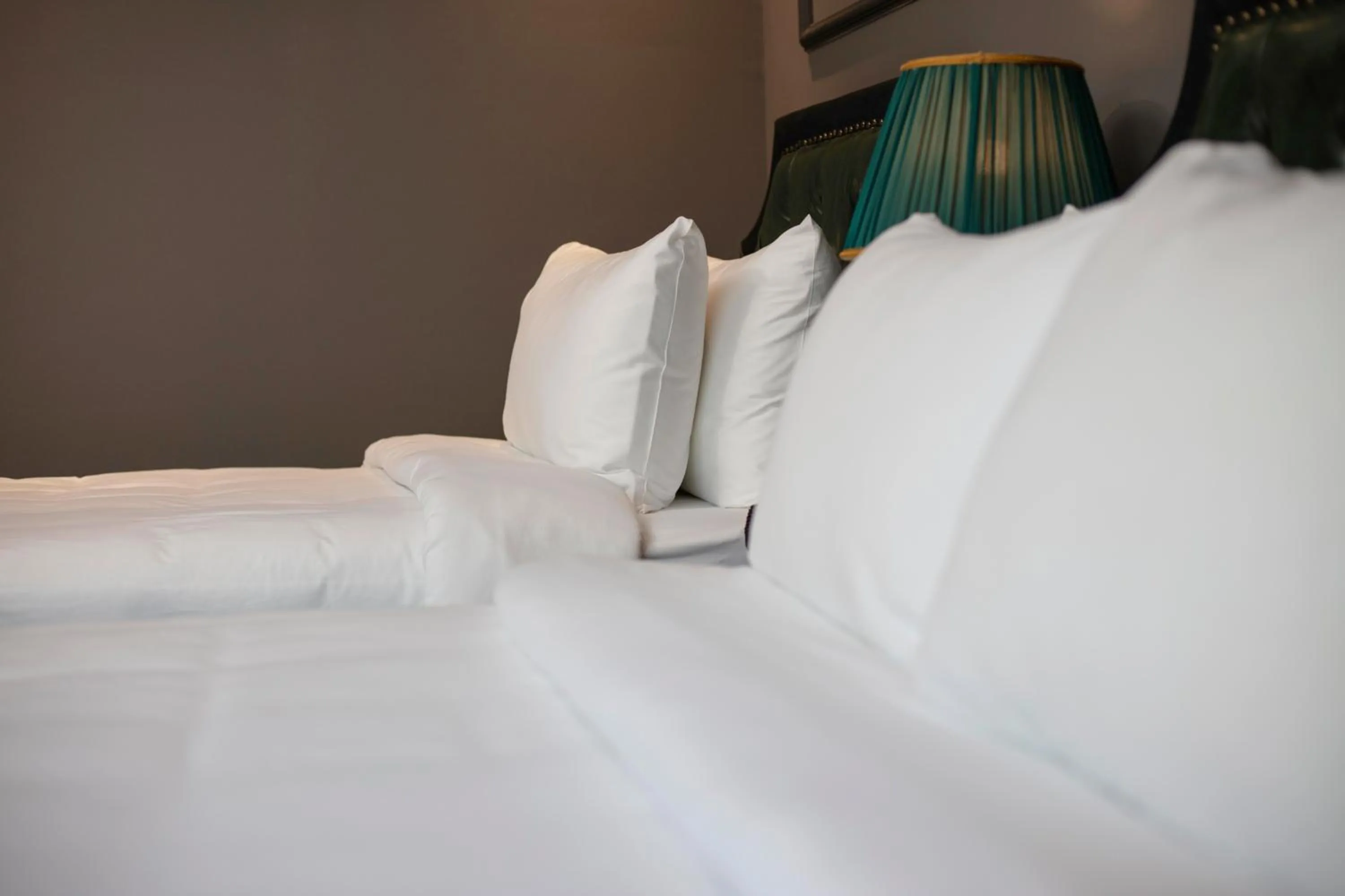 Bed in Madelise Stardust Hotel & Travel