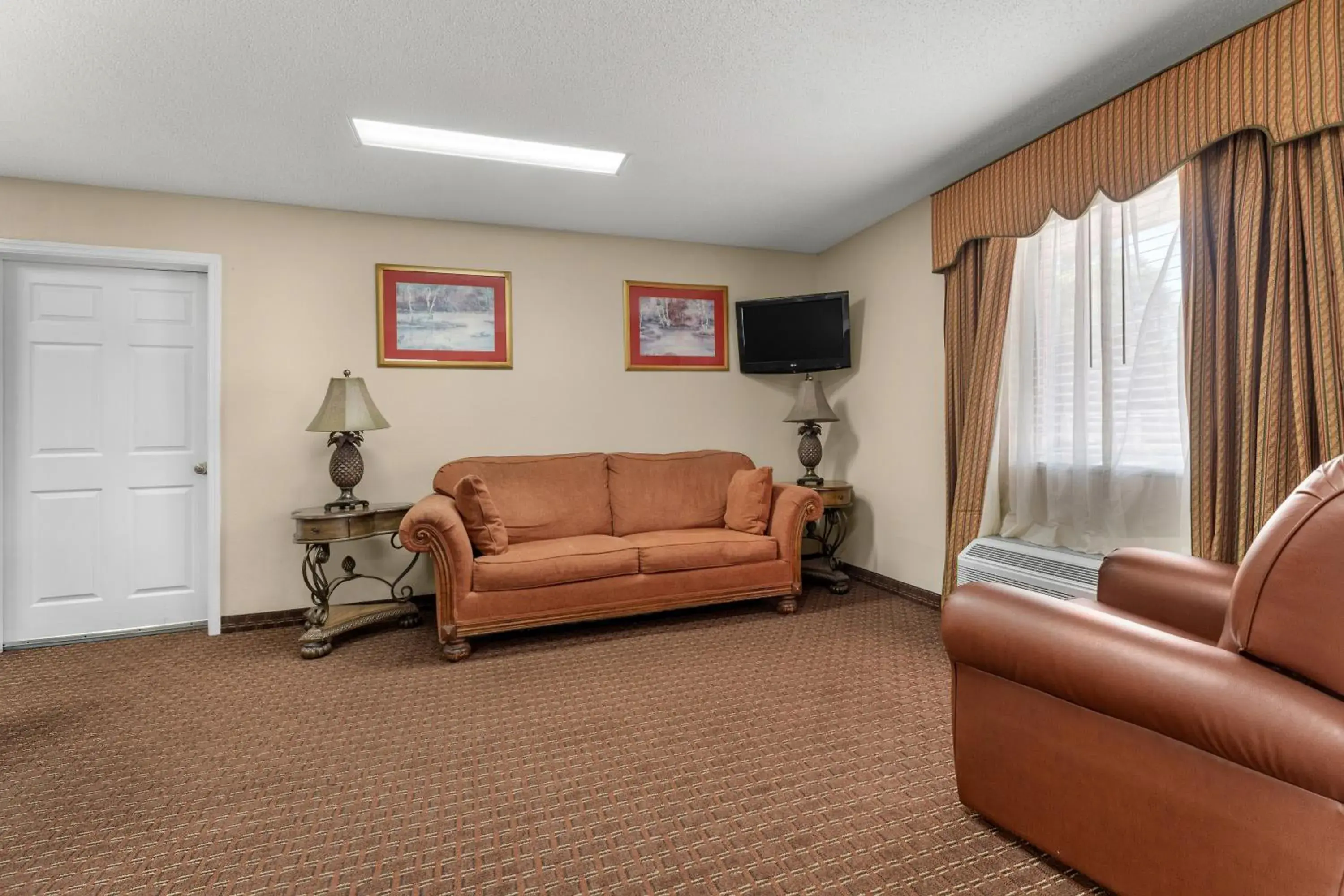 Living room in Americas Best Value Inn-Montezuma Living room in Americas Best Value Inn-Montezuma