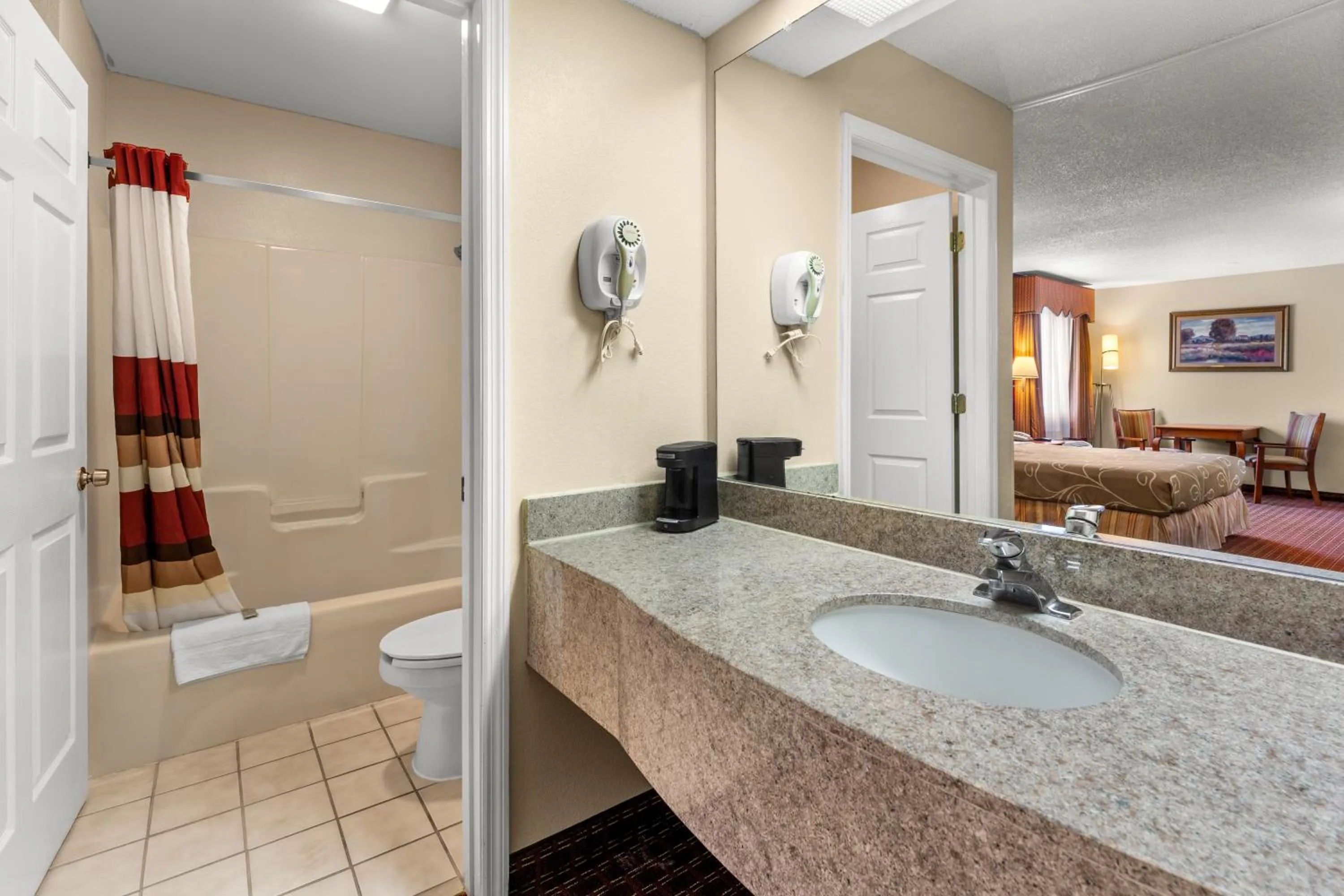 Shower in Americas Best Value Inn-Montezuma
