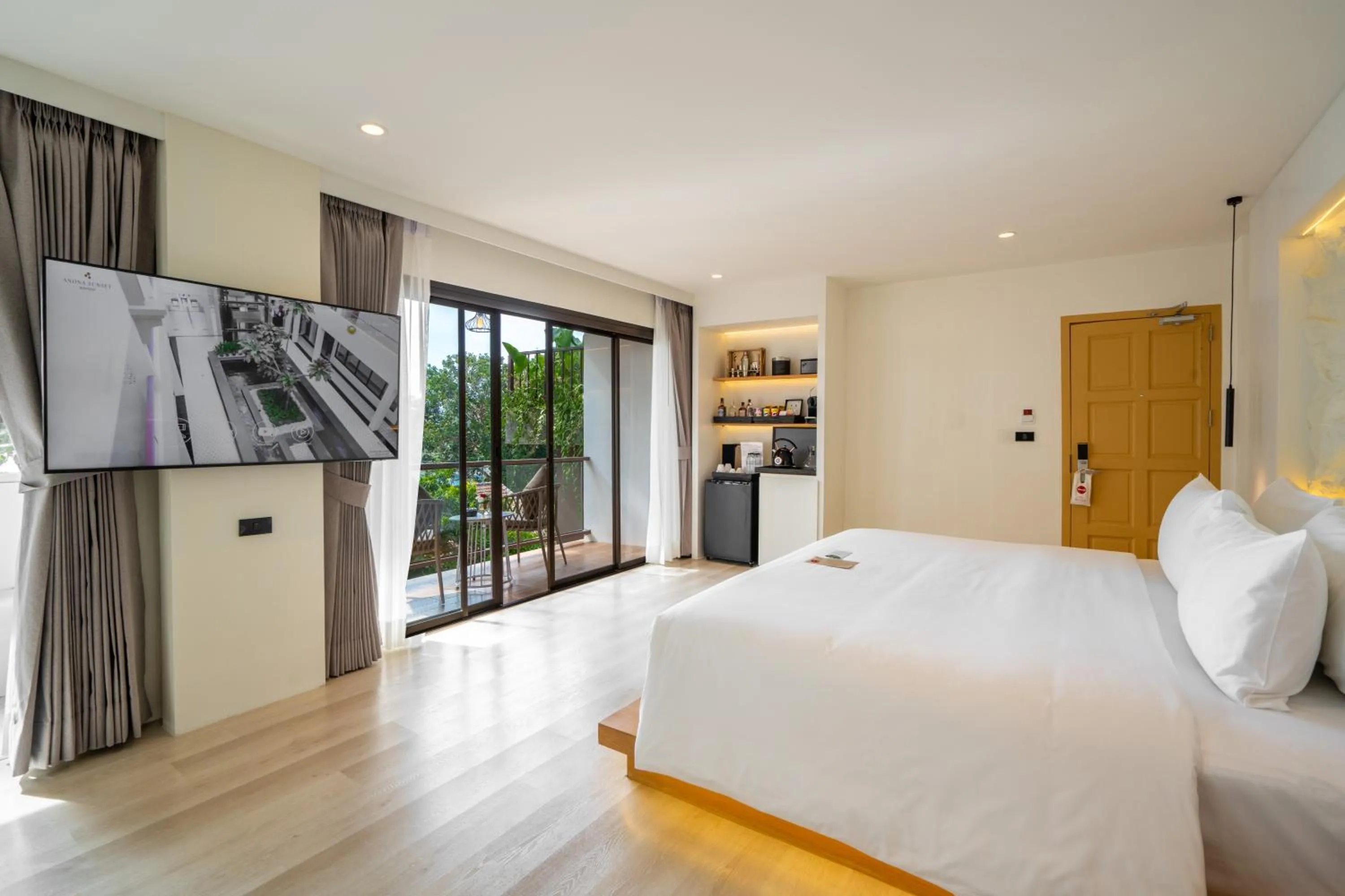 Bed in ANONA SUNSET Boutique