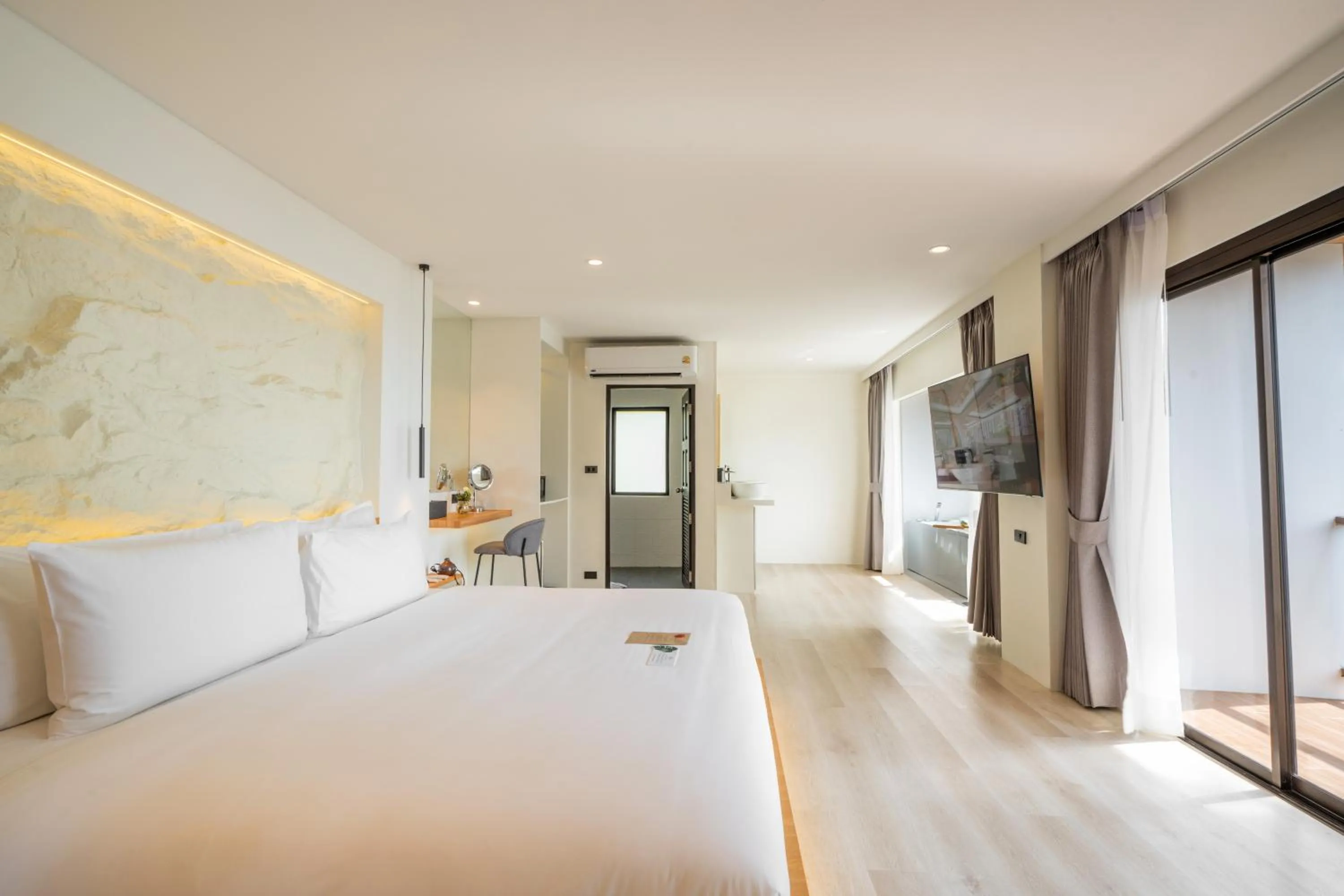 Bed in ANONA SUNSET Boutique