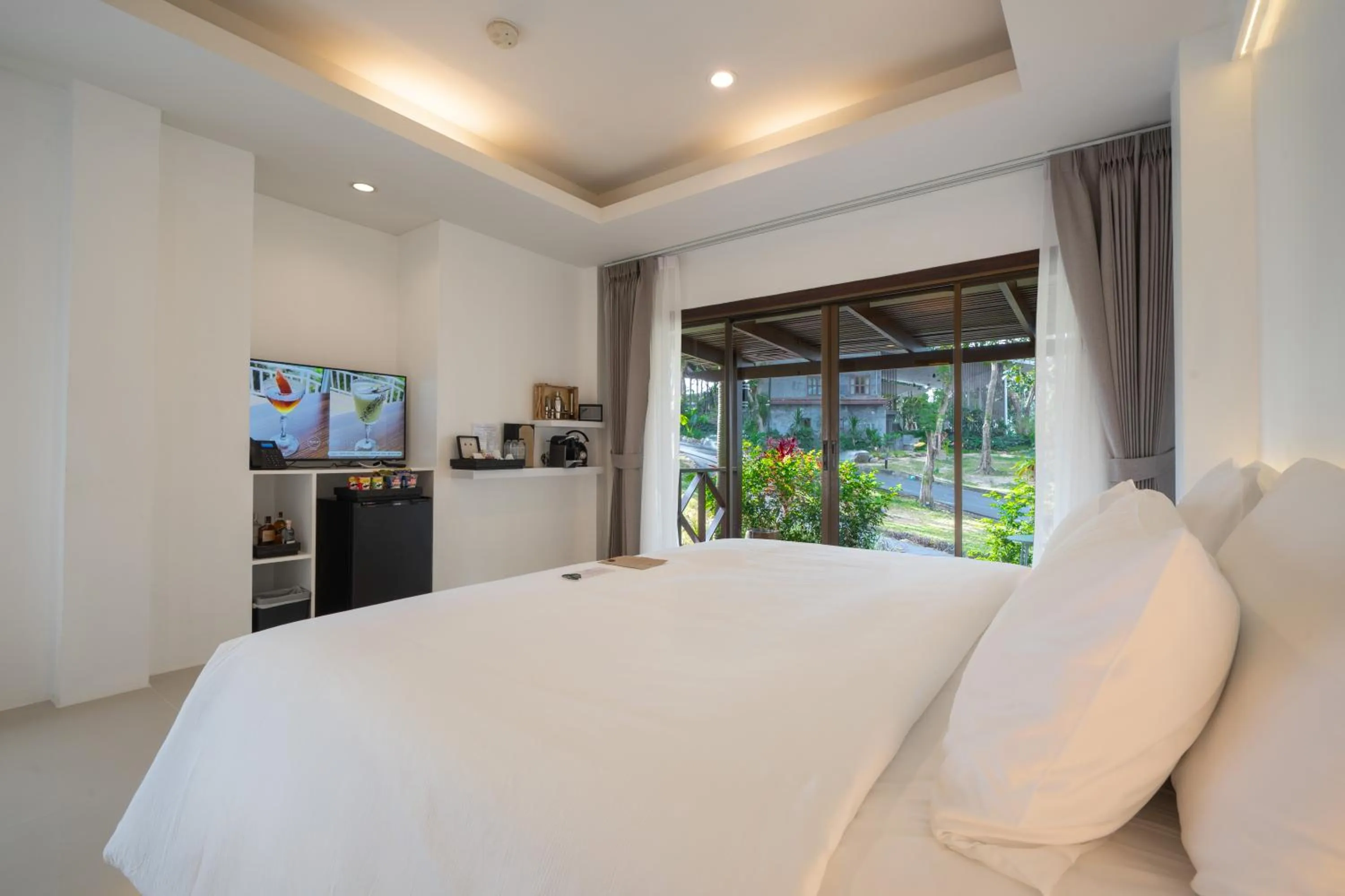 Bed in ANONA SUNSET Boutique