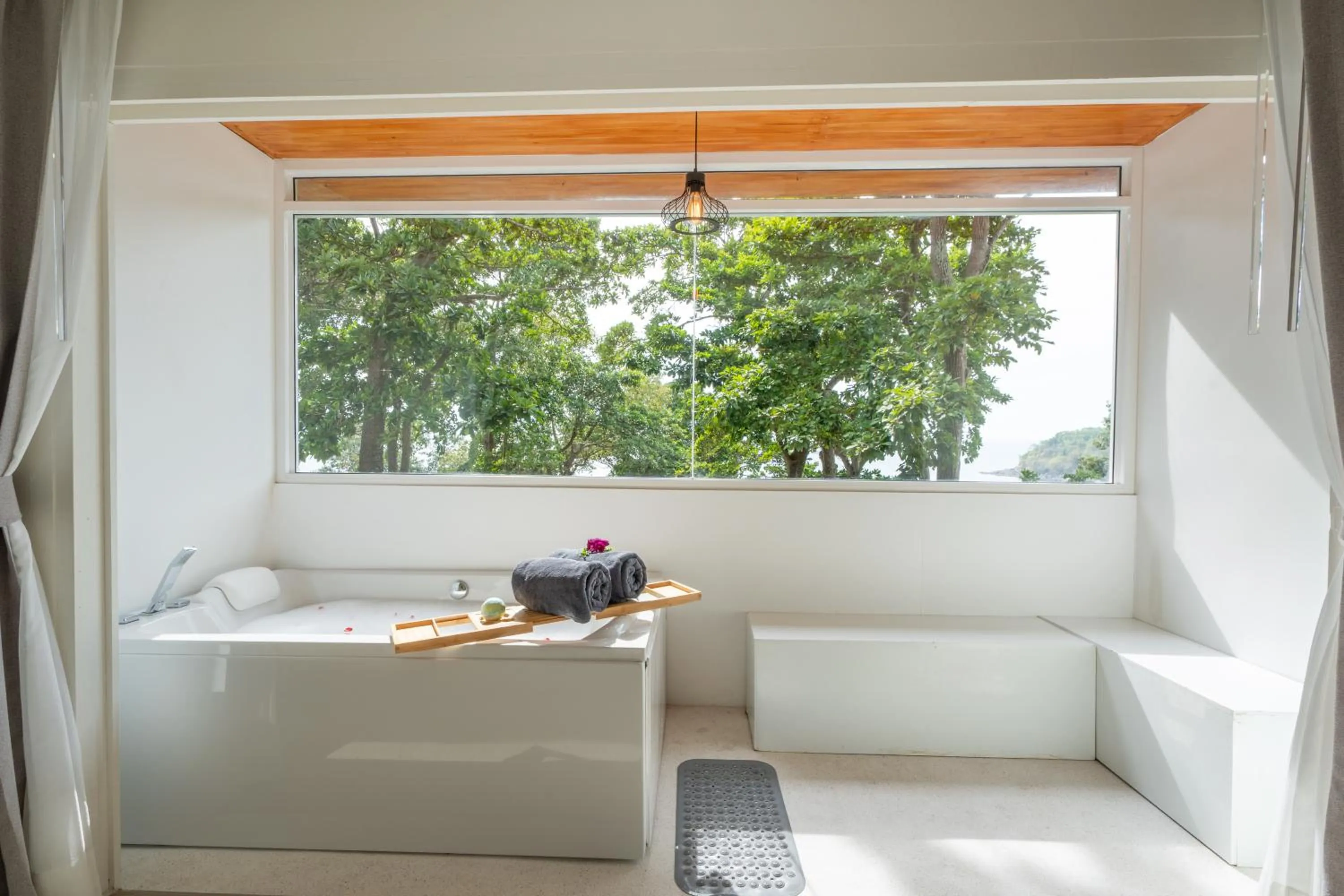 Bed in ANONA SUNSET Boutique