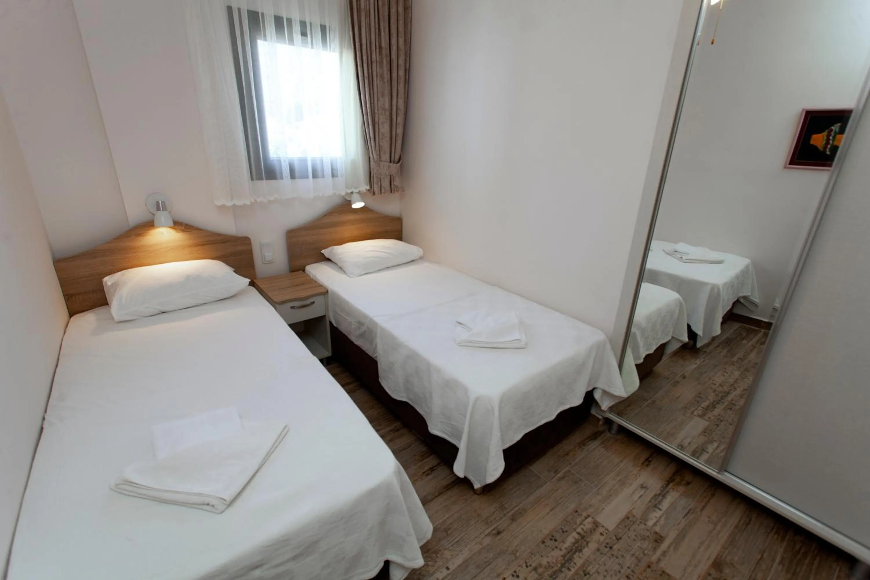 Bed in Diplomat Suites