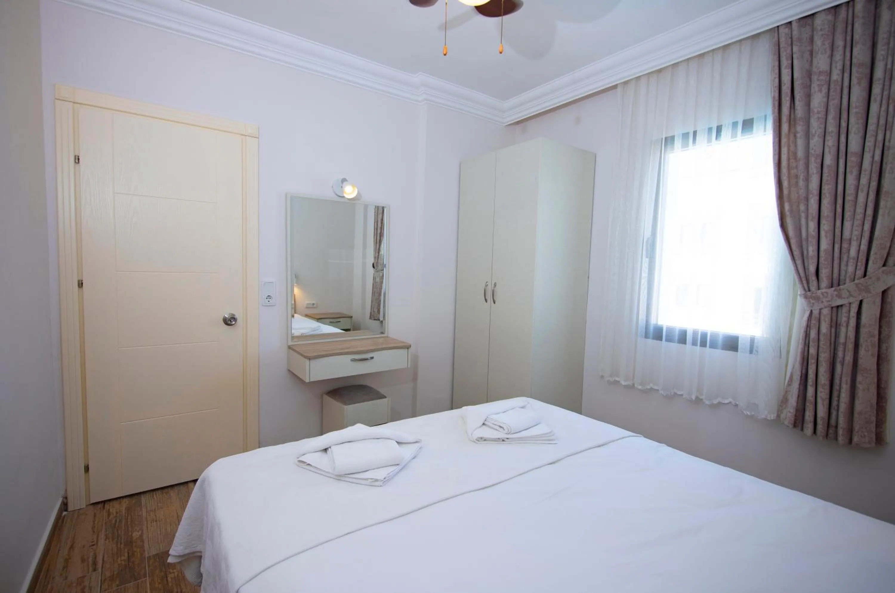 Bed in Diplomat Suites