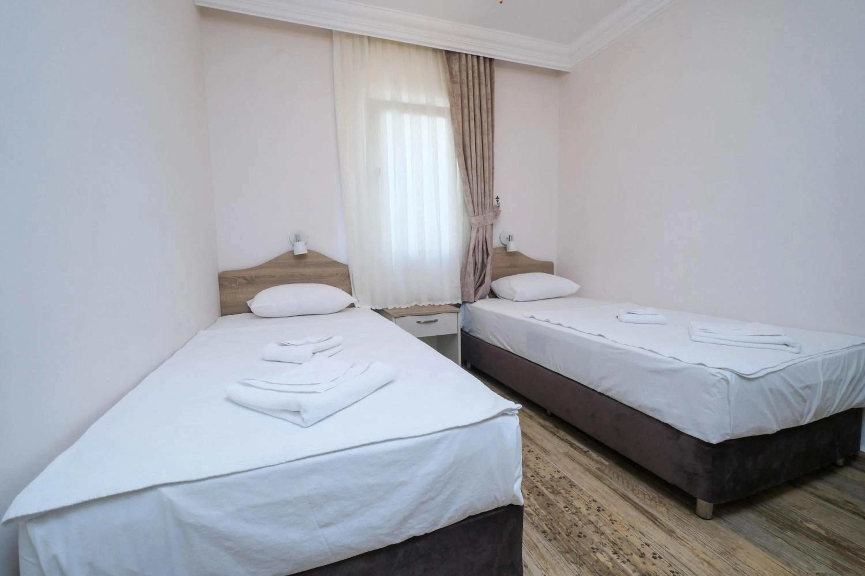 Bed in Diplomat Suites