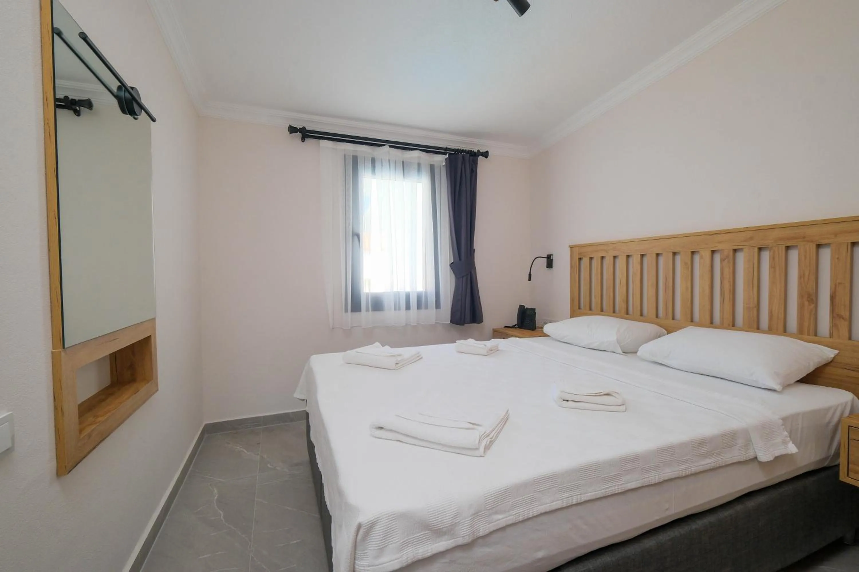 Bedroom in Diplomat Suites
