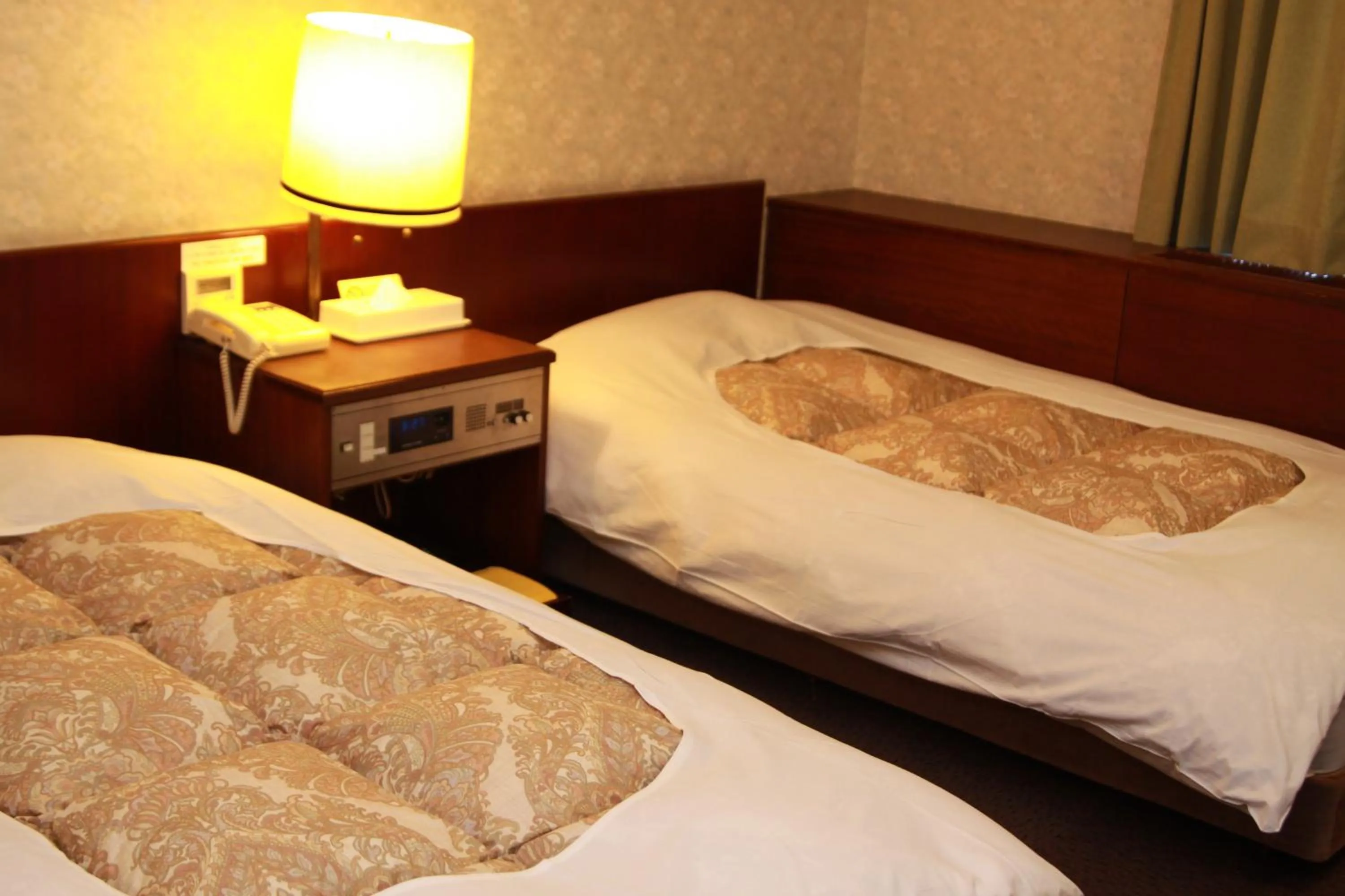 Bed in Hotel Los Inn Kochi