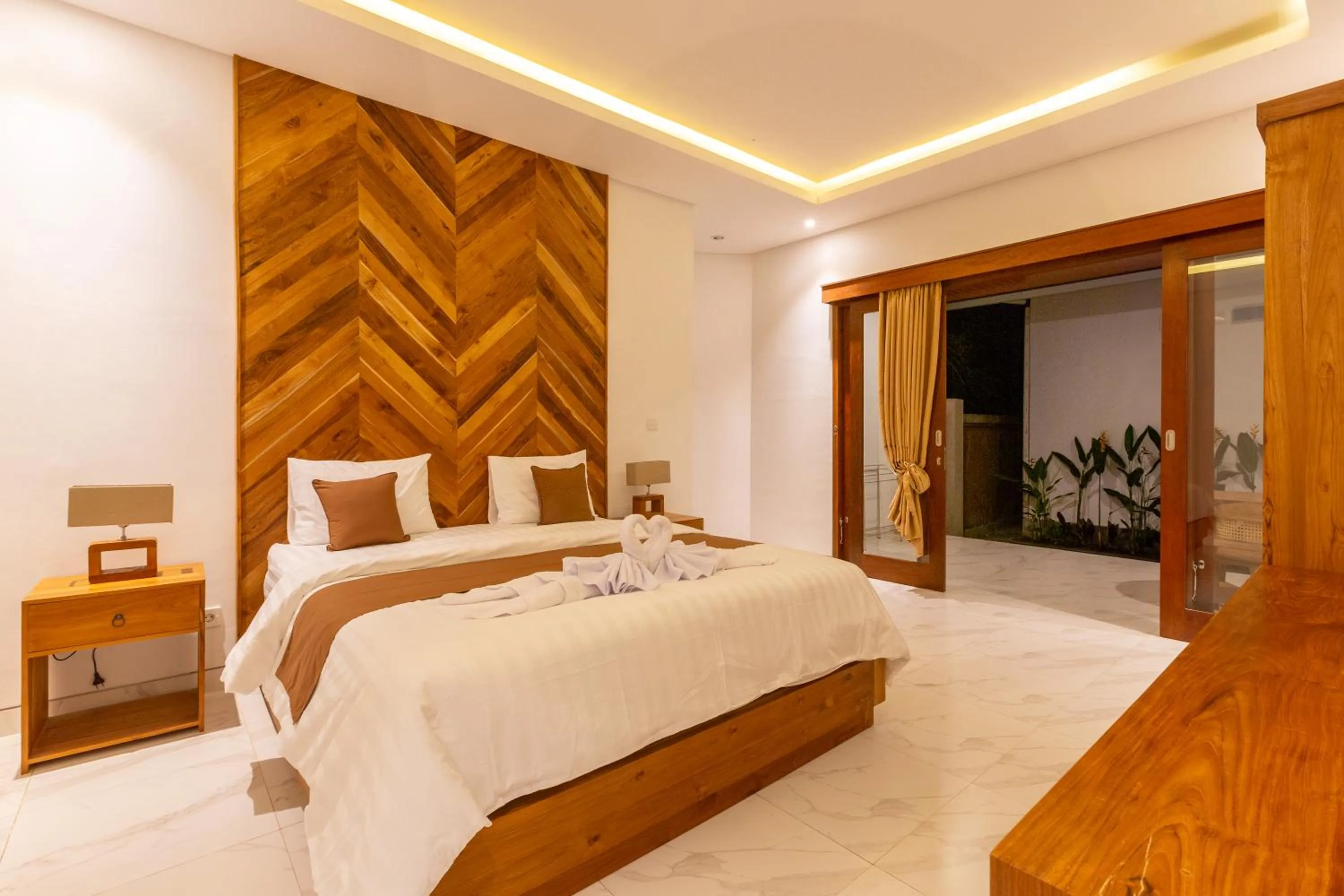 Bed in Sapta D'Villa Residence by Purely