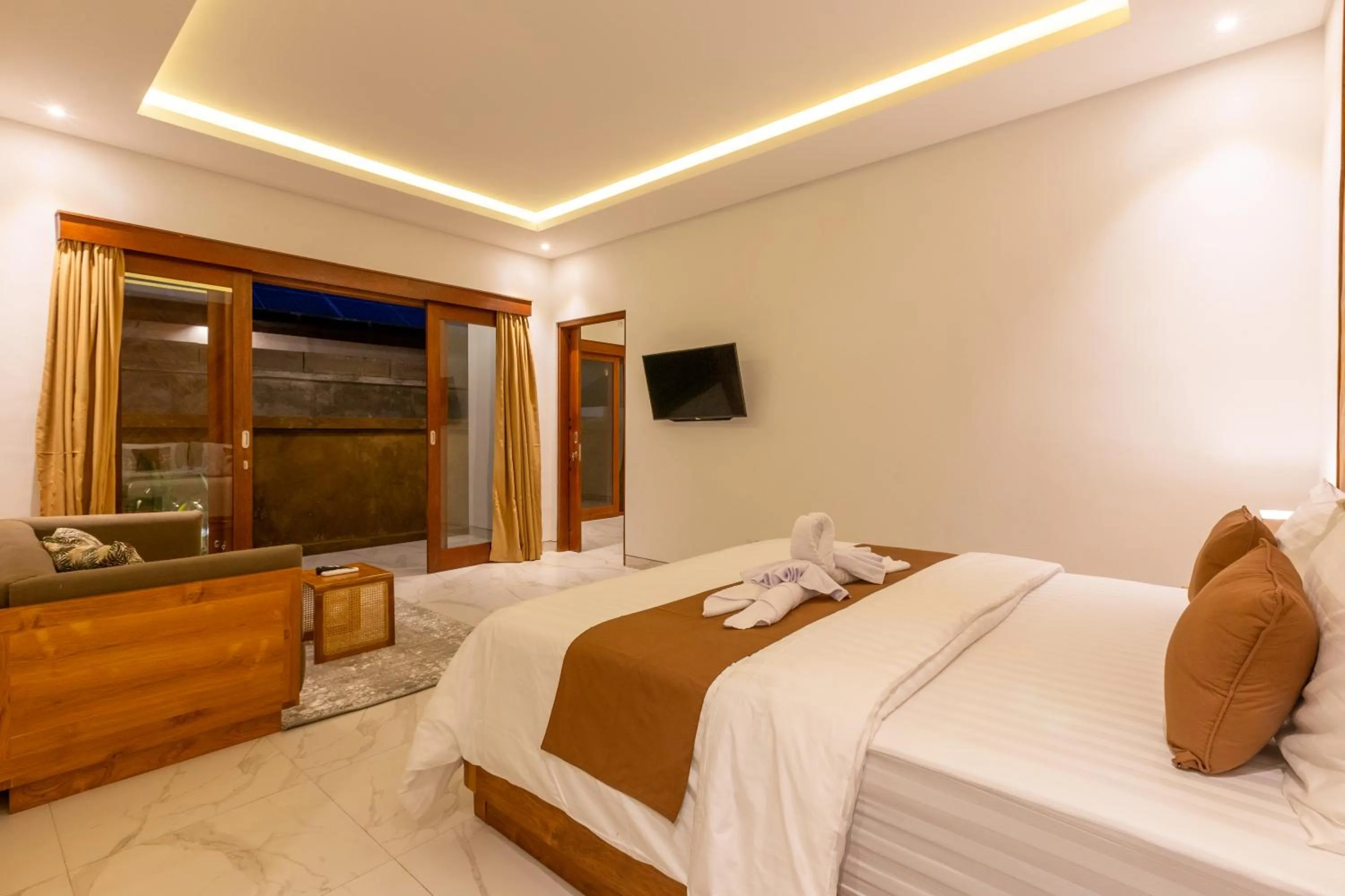 Bed in Sapta D'Villa Residence by Purely