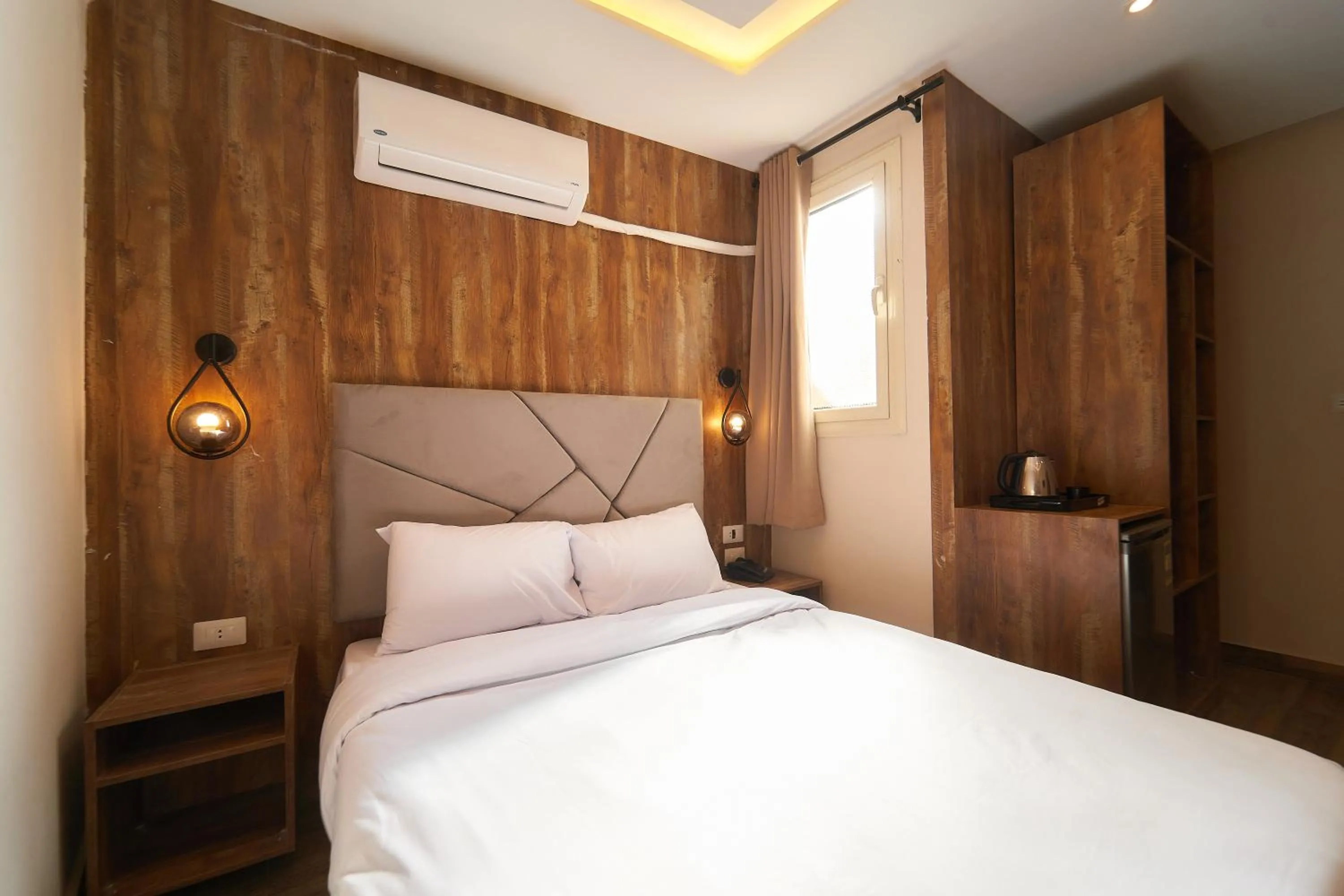 Bed in Crown Pyramids View Hotel