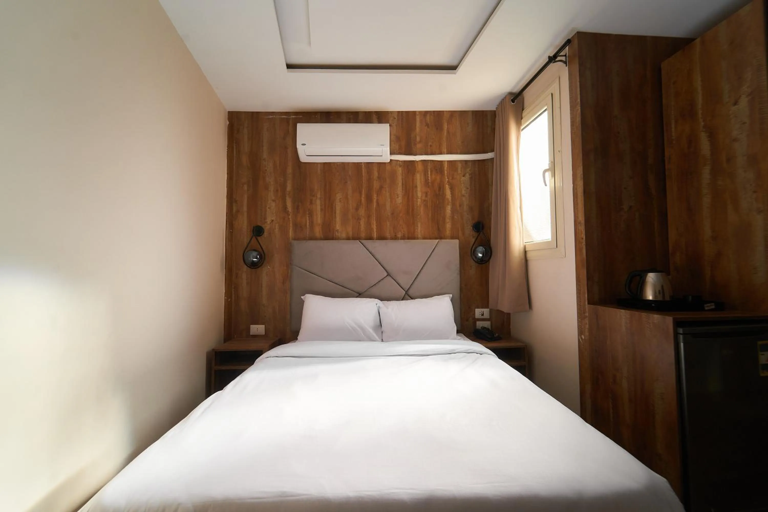 Bed in Crown Pyramids View Hotel