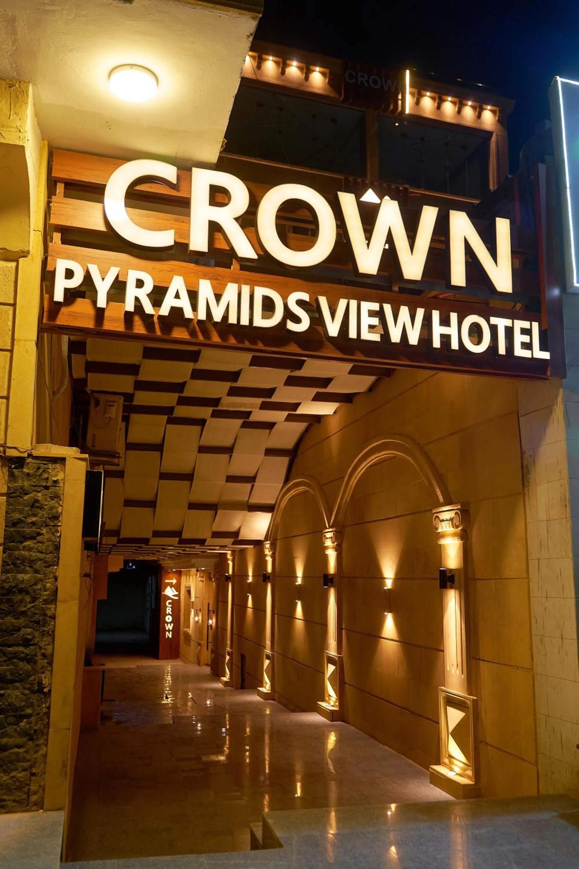 Night in Crown Pyramids View Hotel