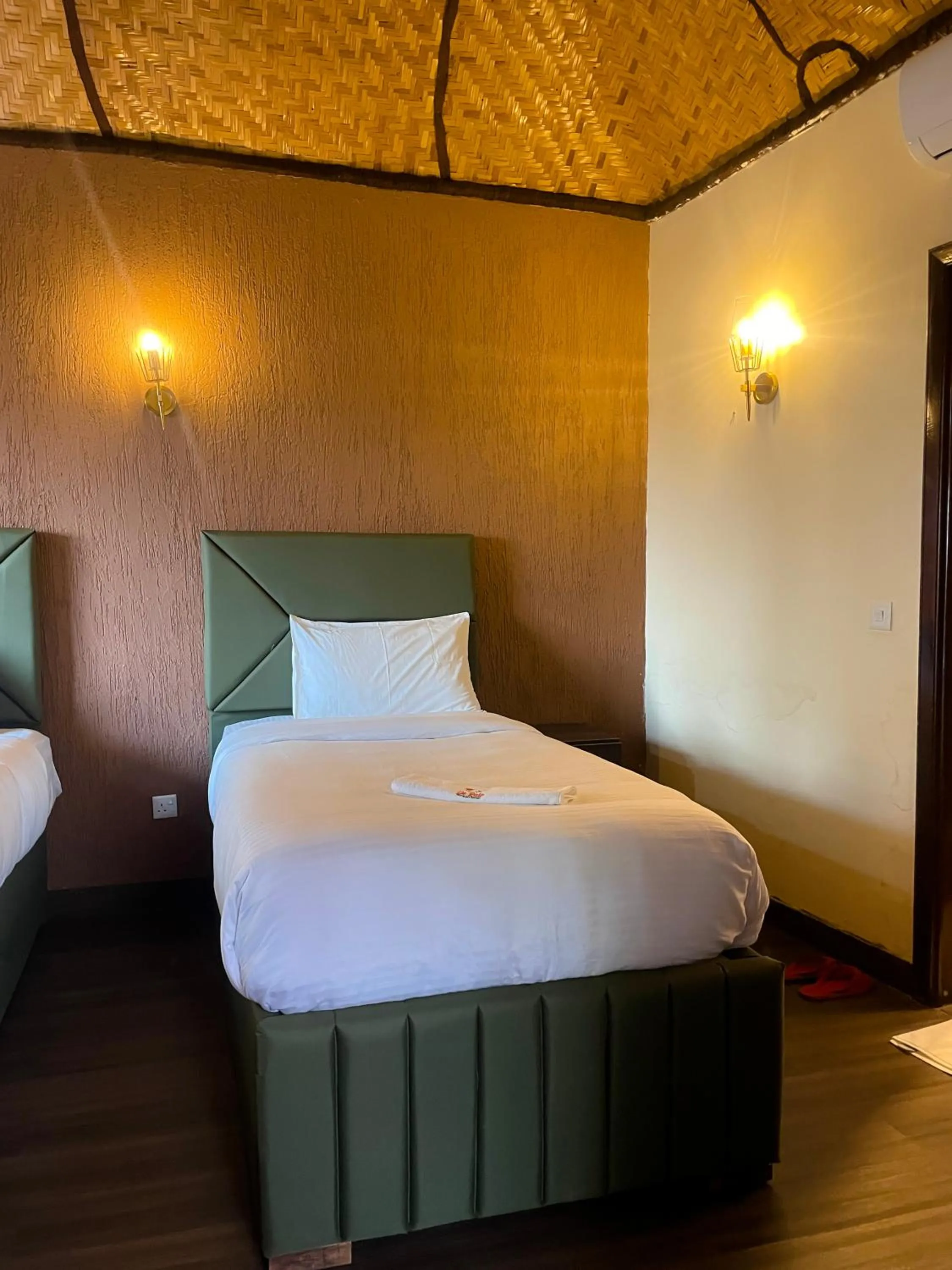 Bed in De Rain Eco Beach Resort