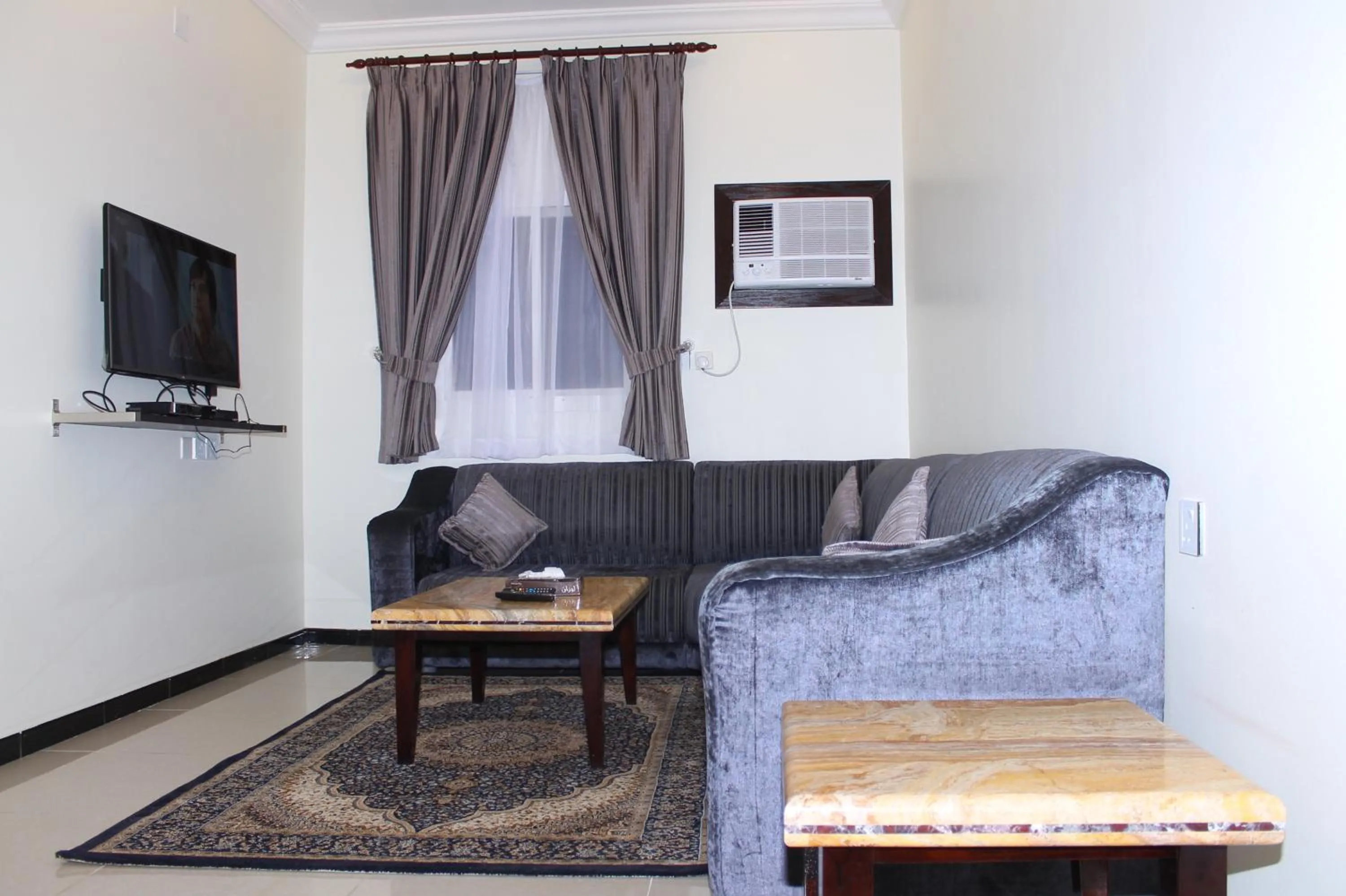 Living room in فخامة الديار للشقق المخدومة Fakhamat Aldyar For Serviced Apartments