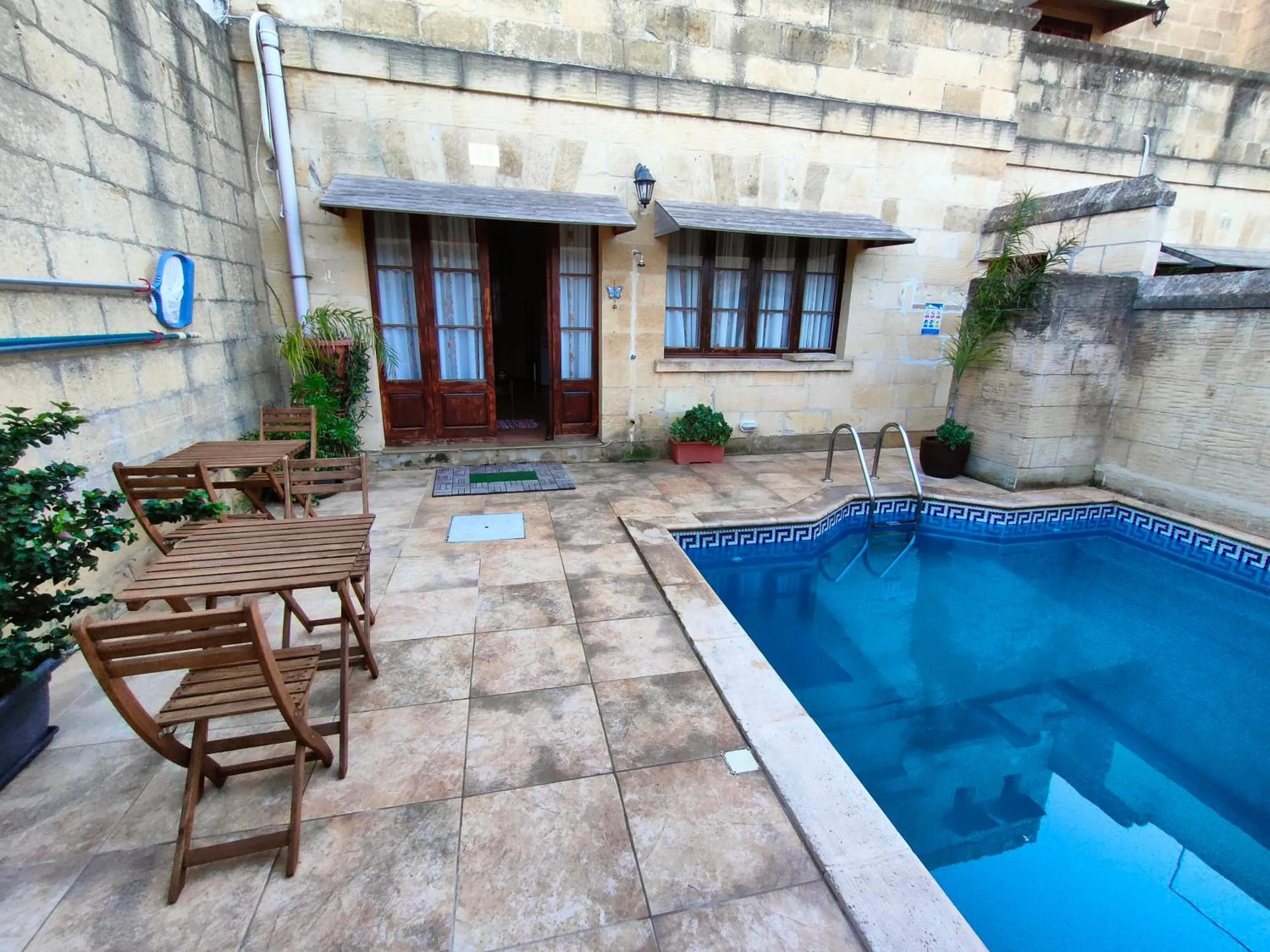 Pool view in Grotto's Paradise B&B