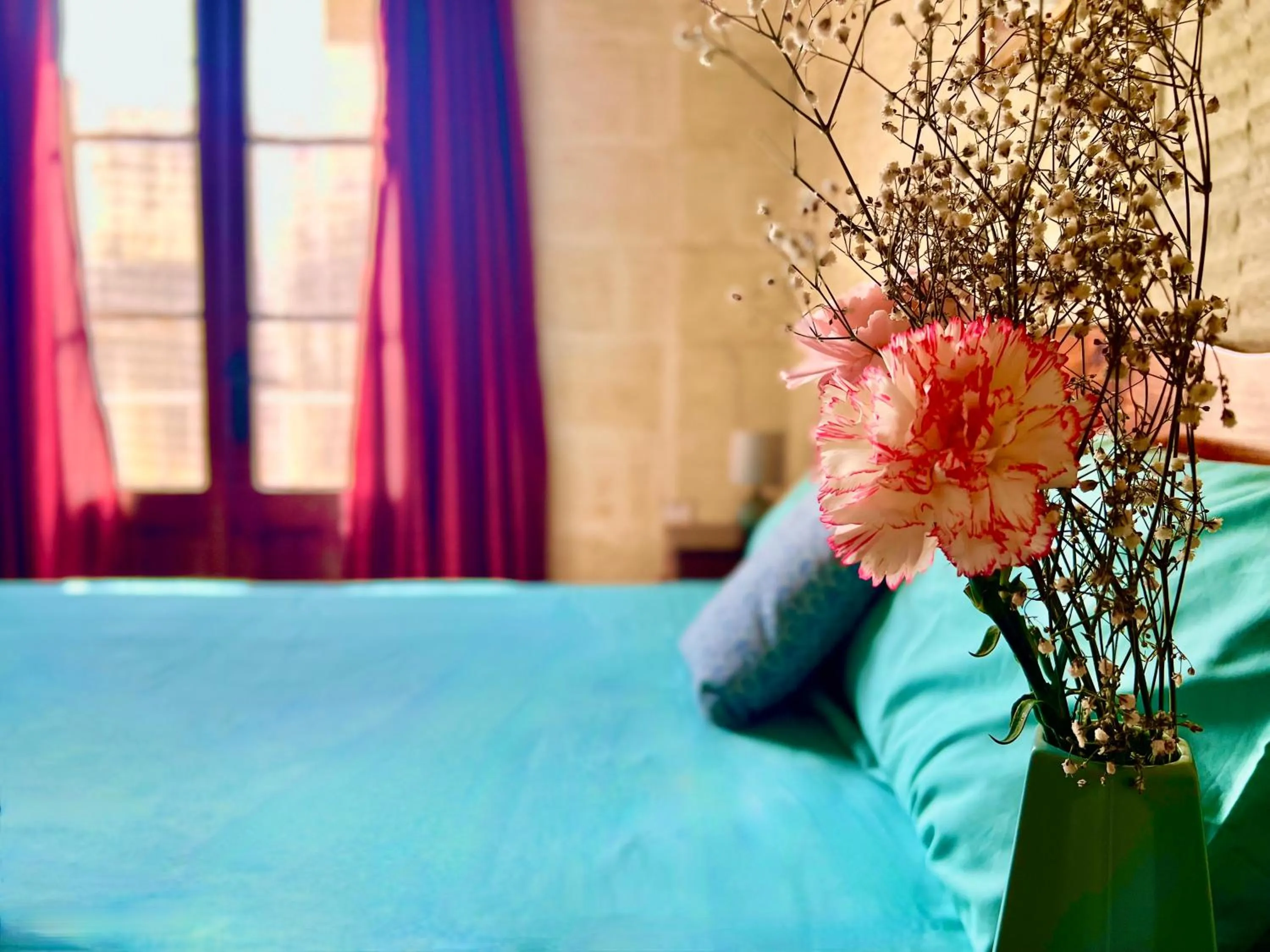 Bed in Grotto's Paradise B&B