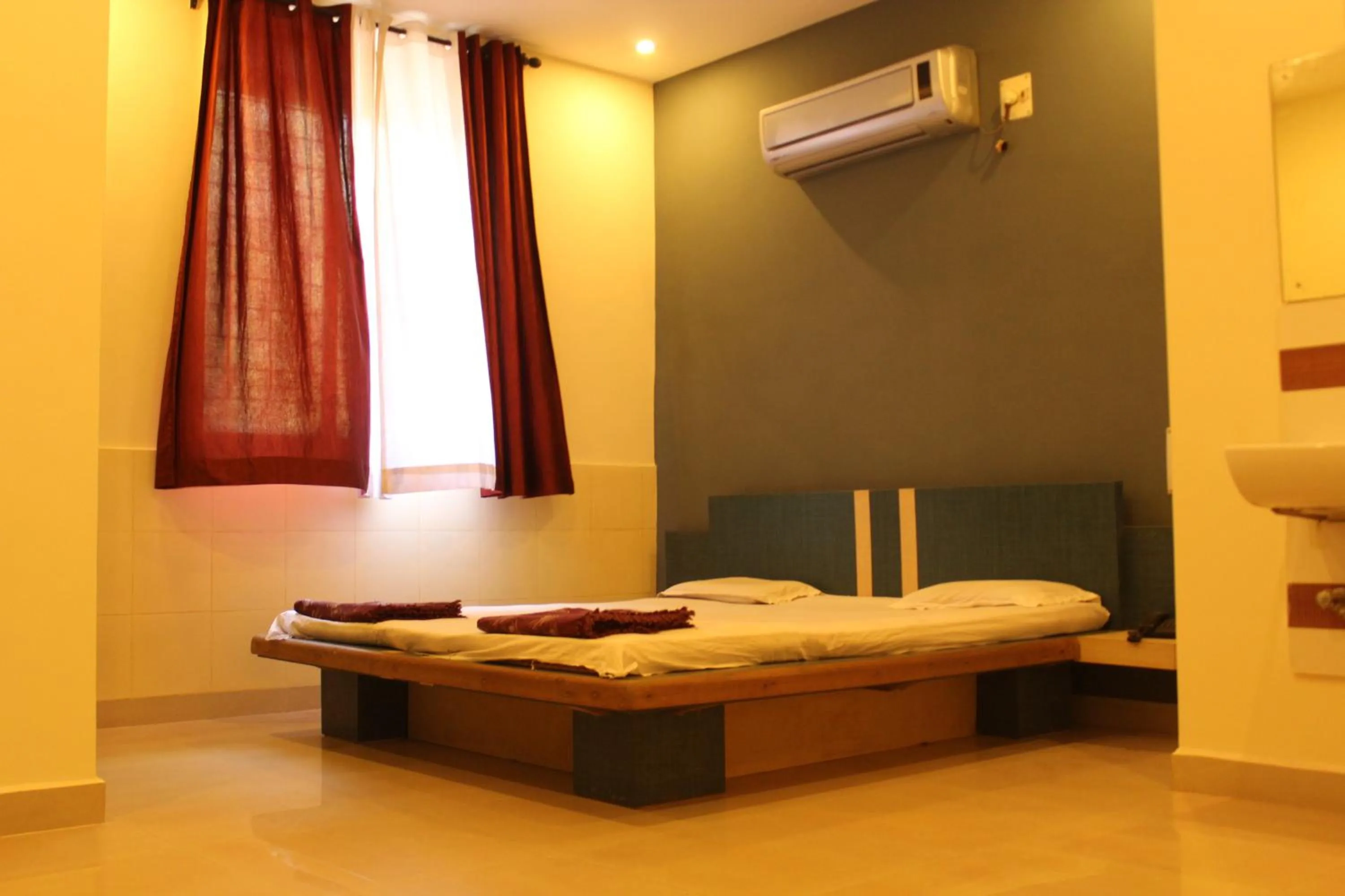 Bed in Hotel Abhiraj