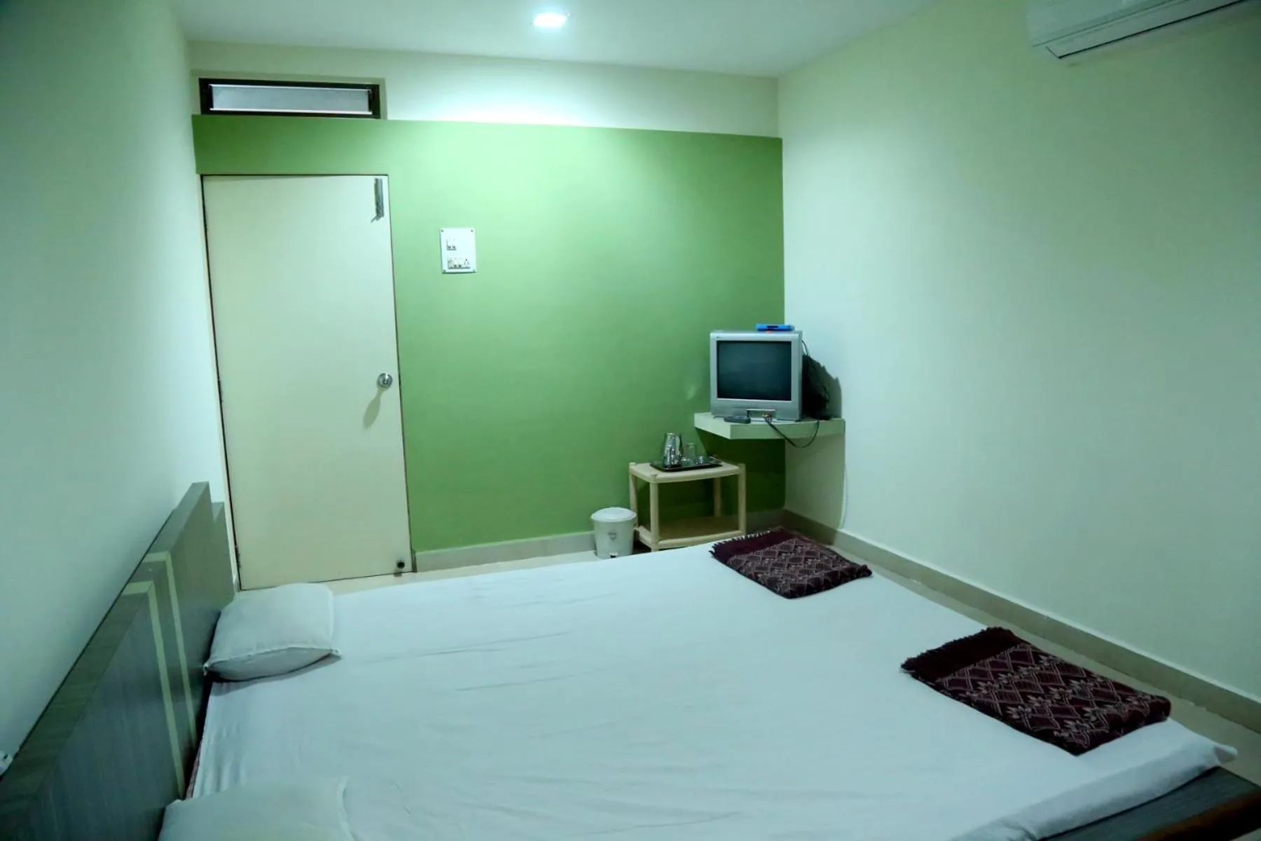 Bed in Hotel Abhiraj