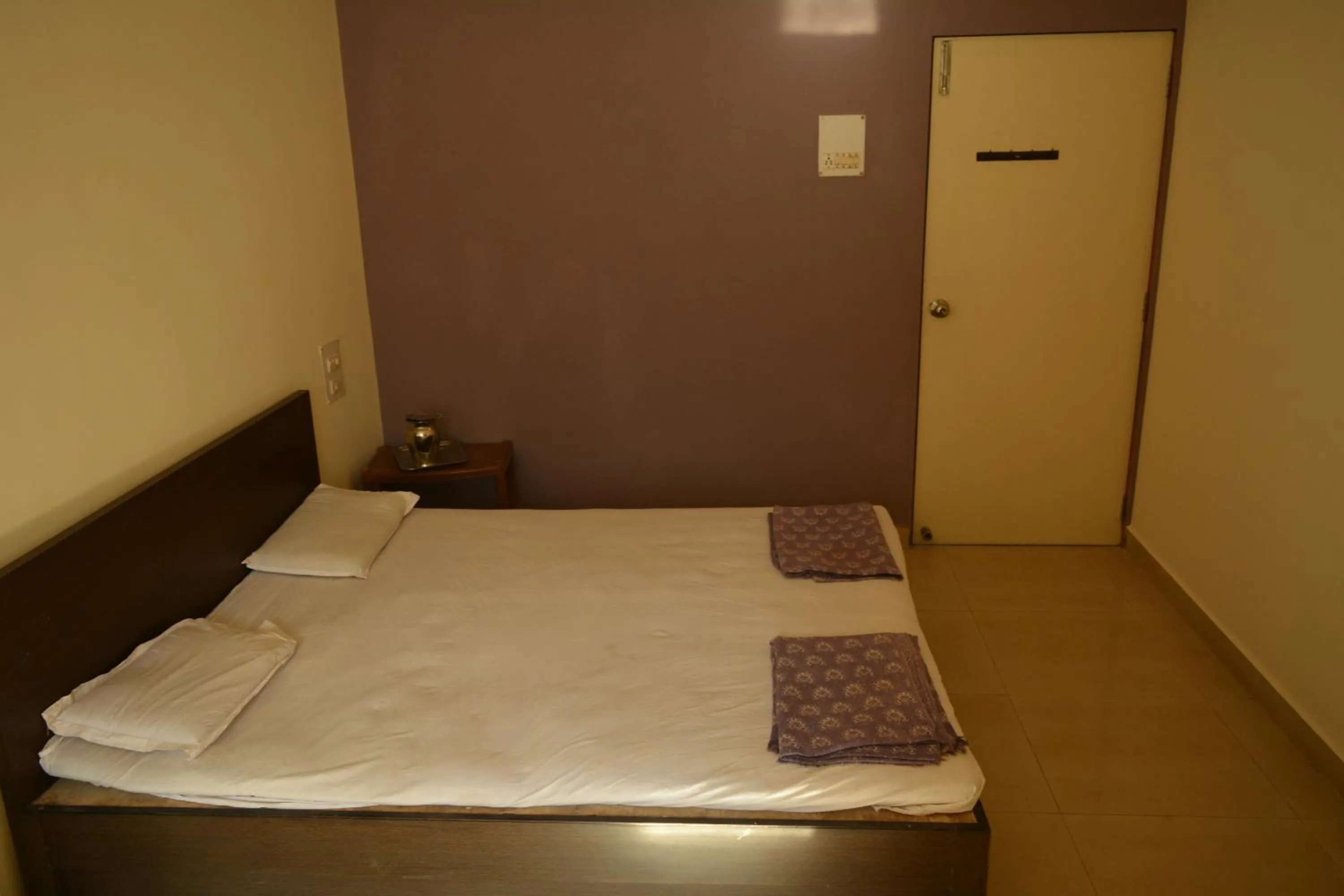 Bed in Hotel Abhiraj