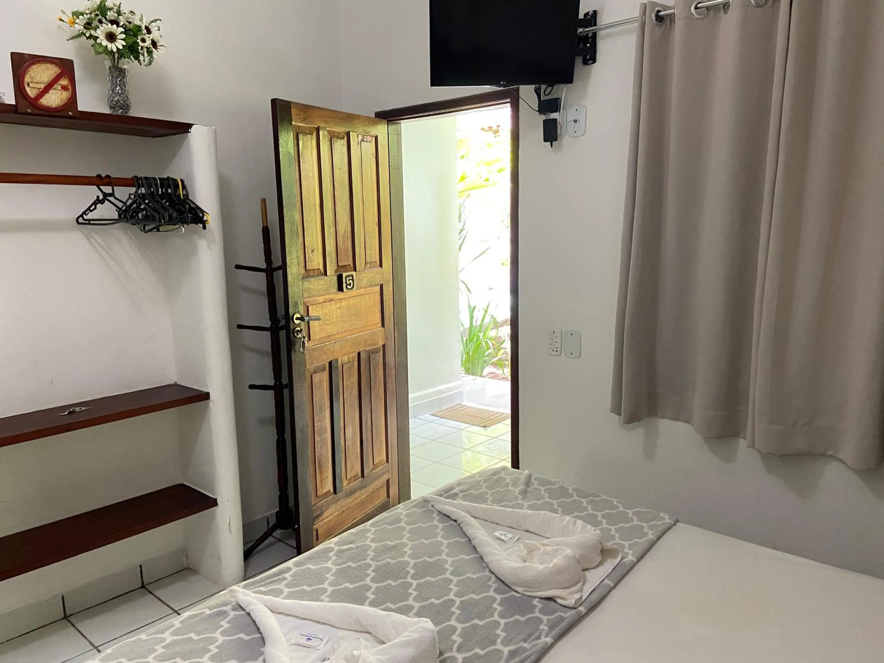 Bed in Pousada do Mineiro