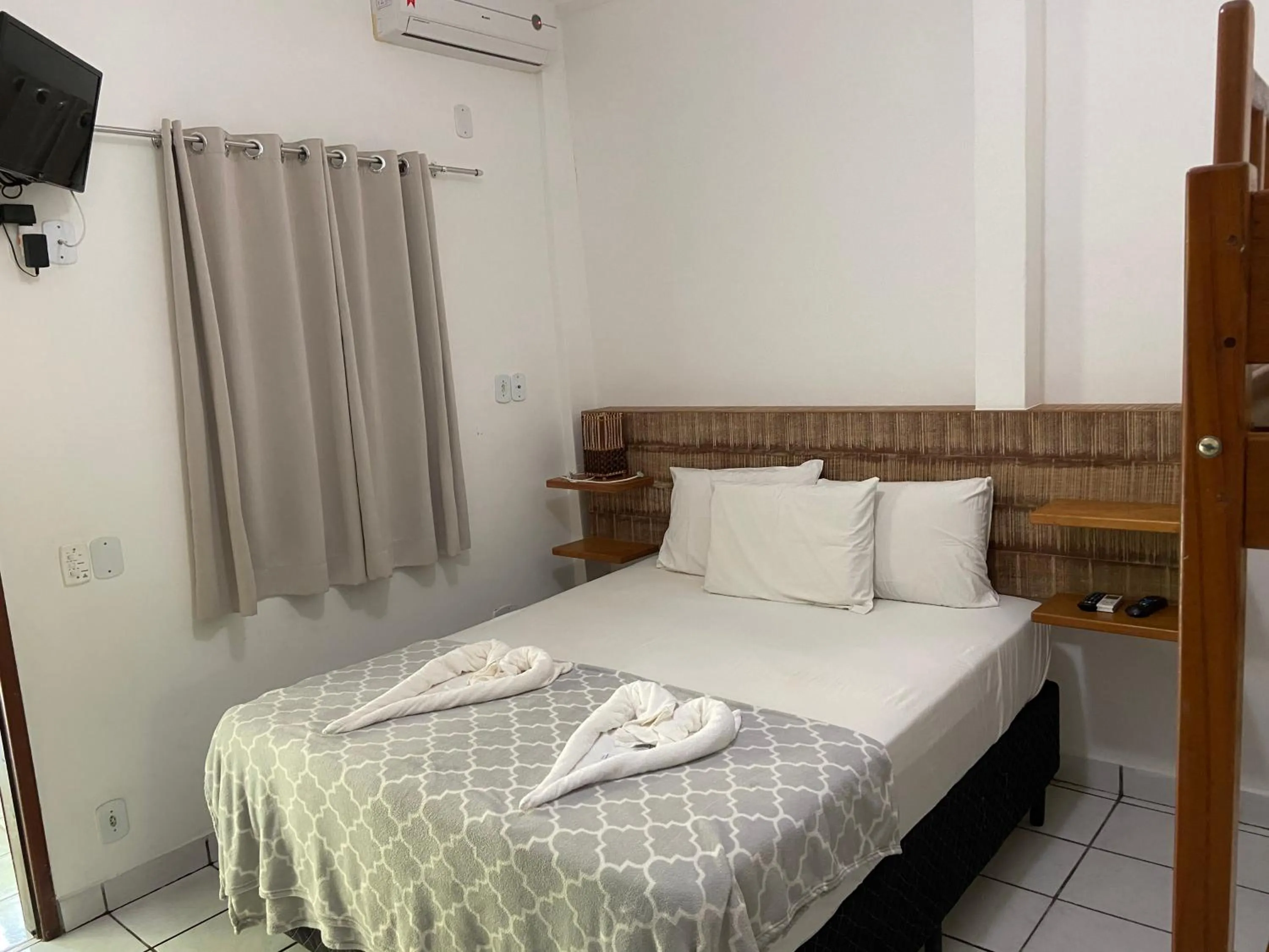 Bed in Pousada do Mineiro