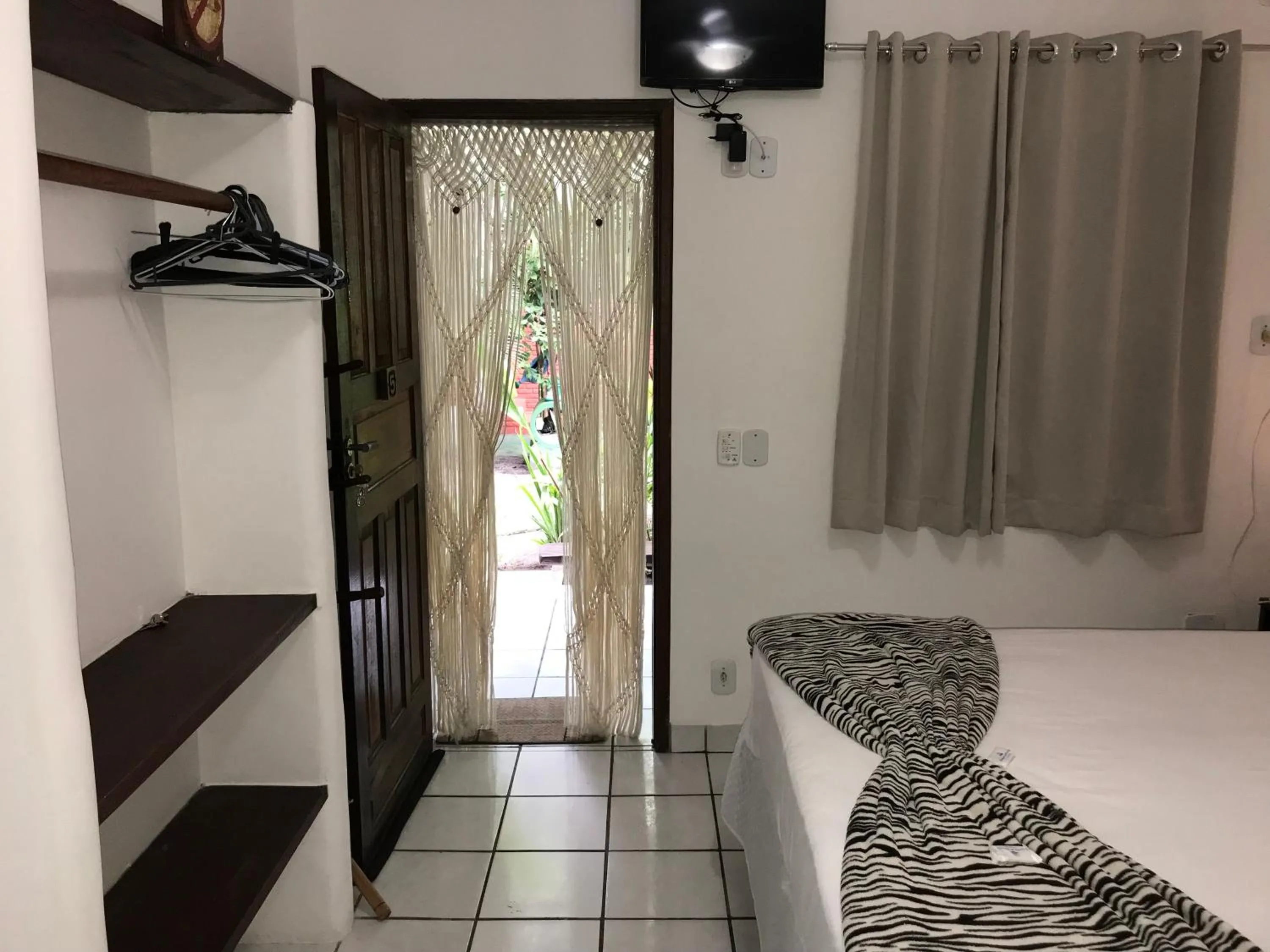 Bed in Pousada do Mineiro