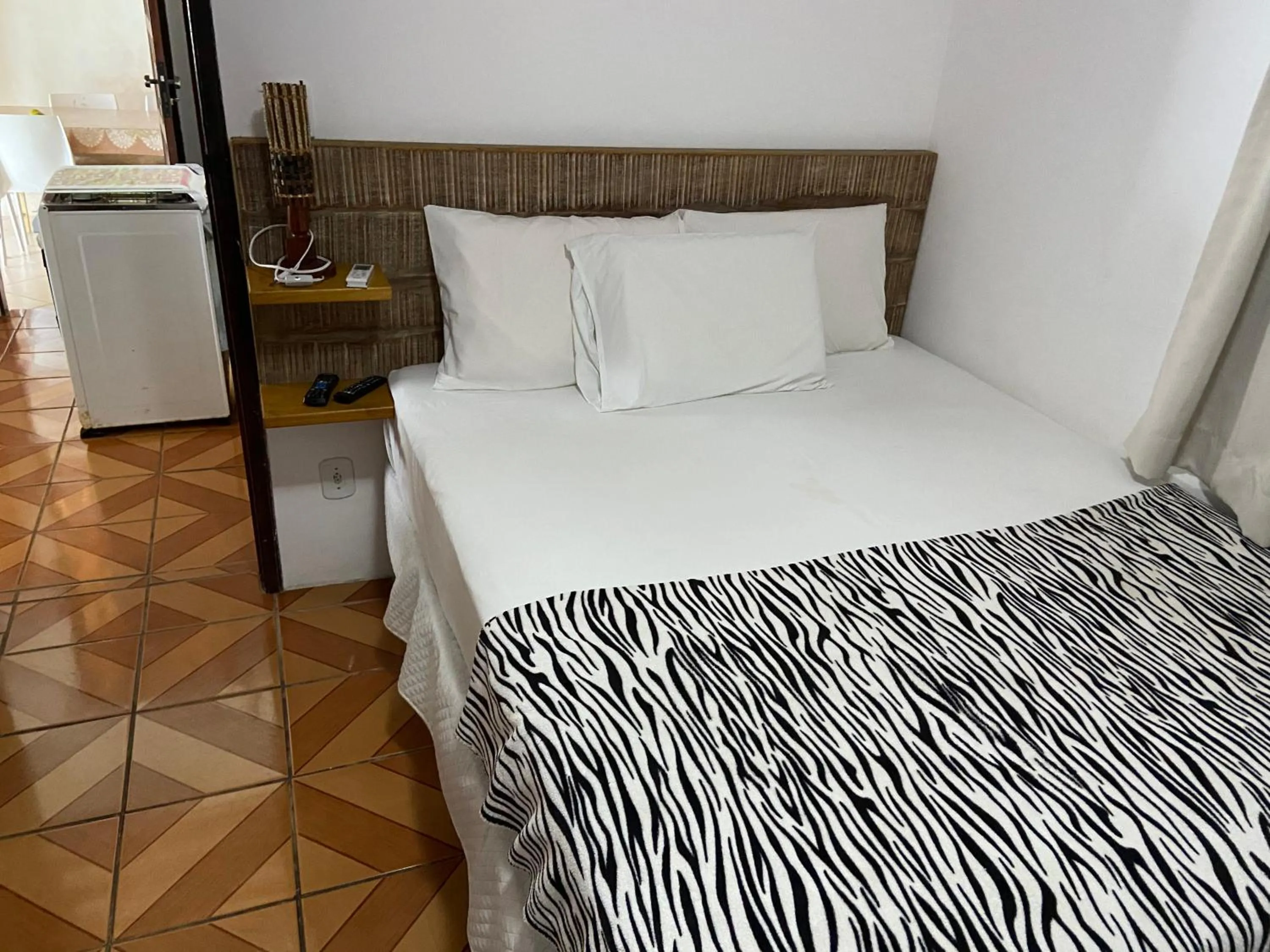Bed in Pousada do Mineiro
