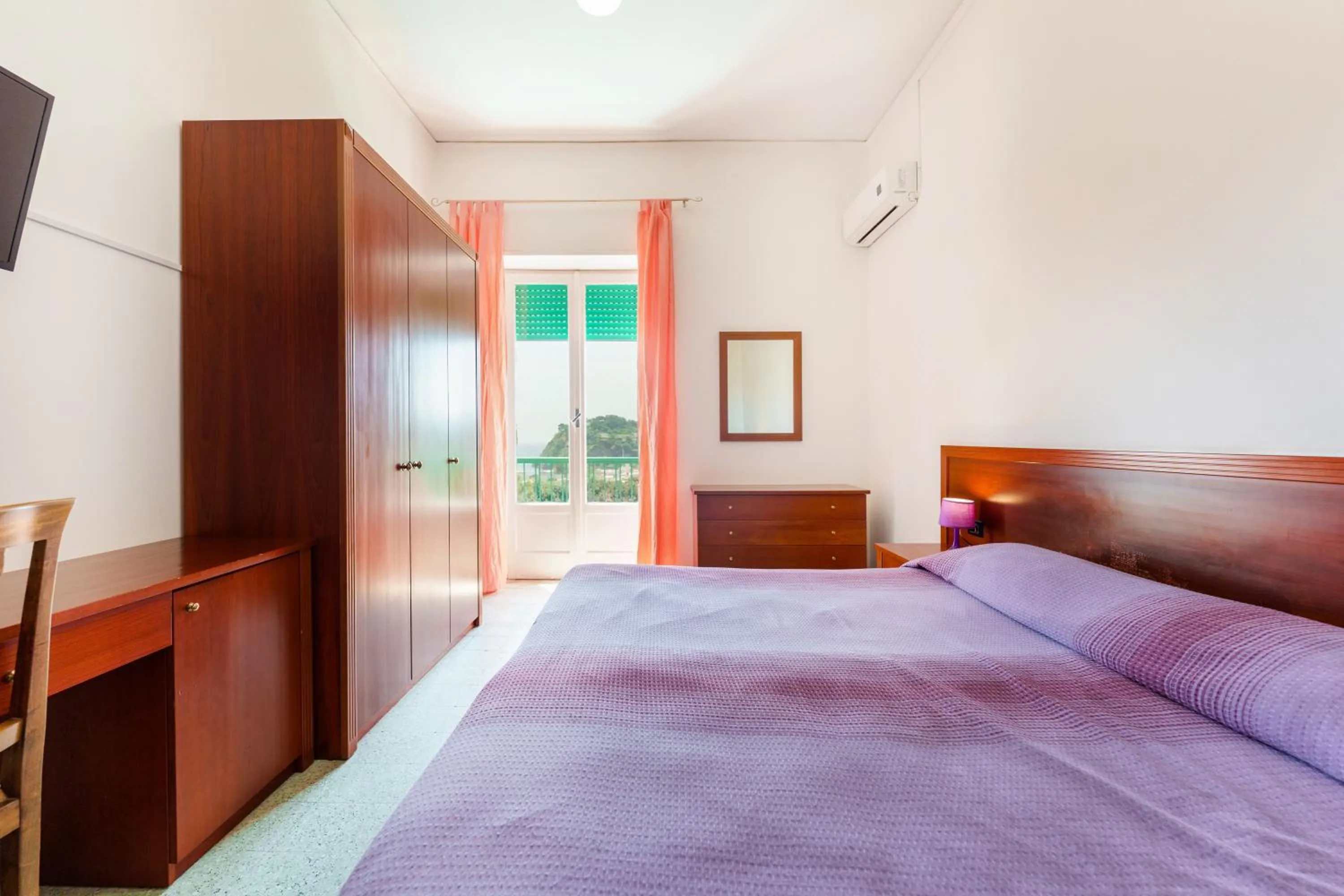 Bed in Hotel Riviera