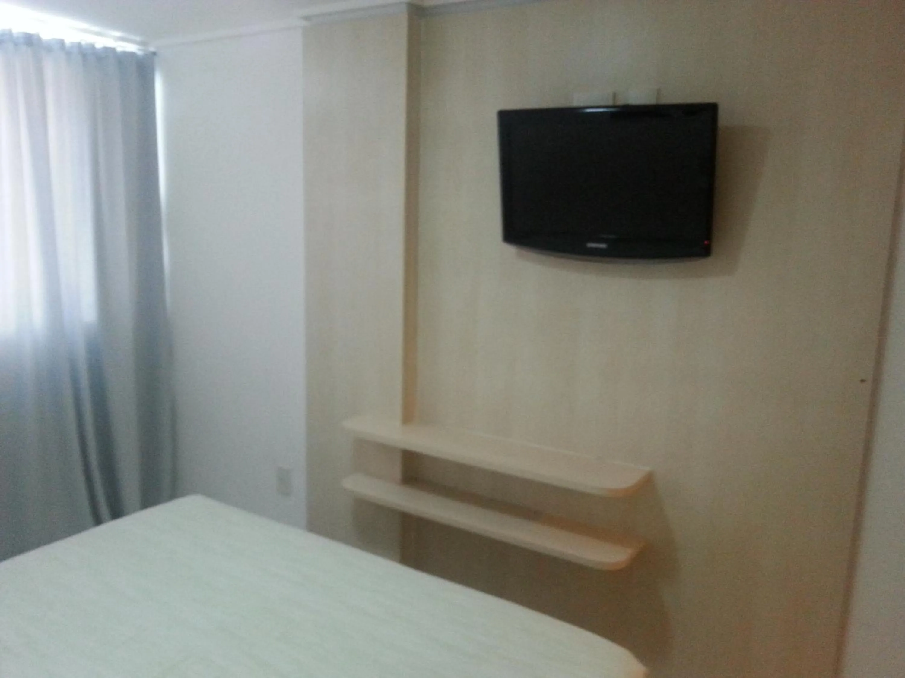 Photo of the whole room, Bed in Manaíra Palace Residence