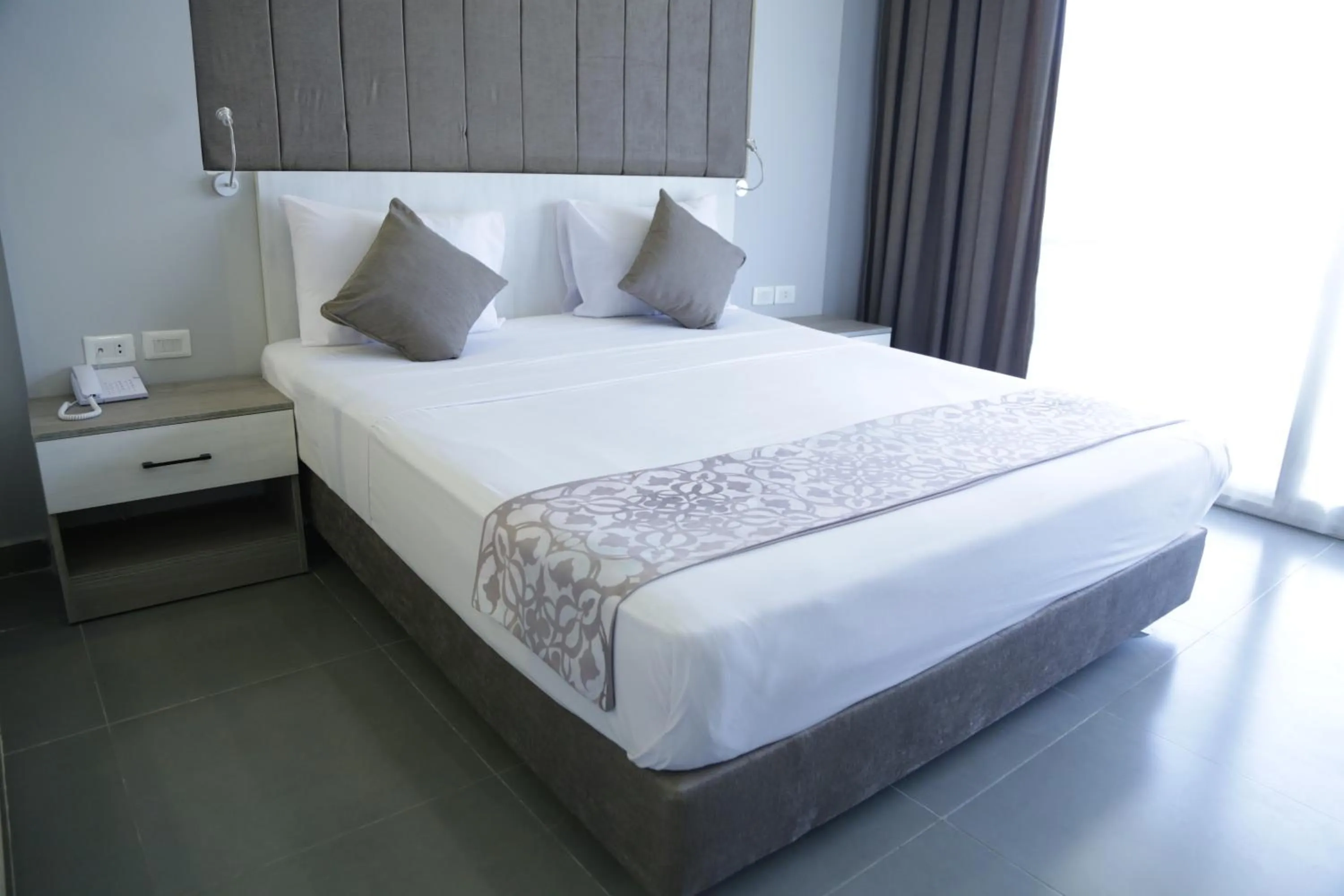 Photo of the whole room, Bed in Aladdin Beach Resort