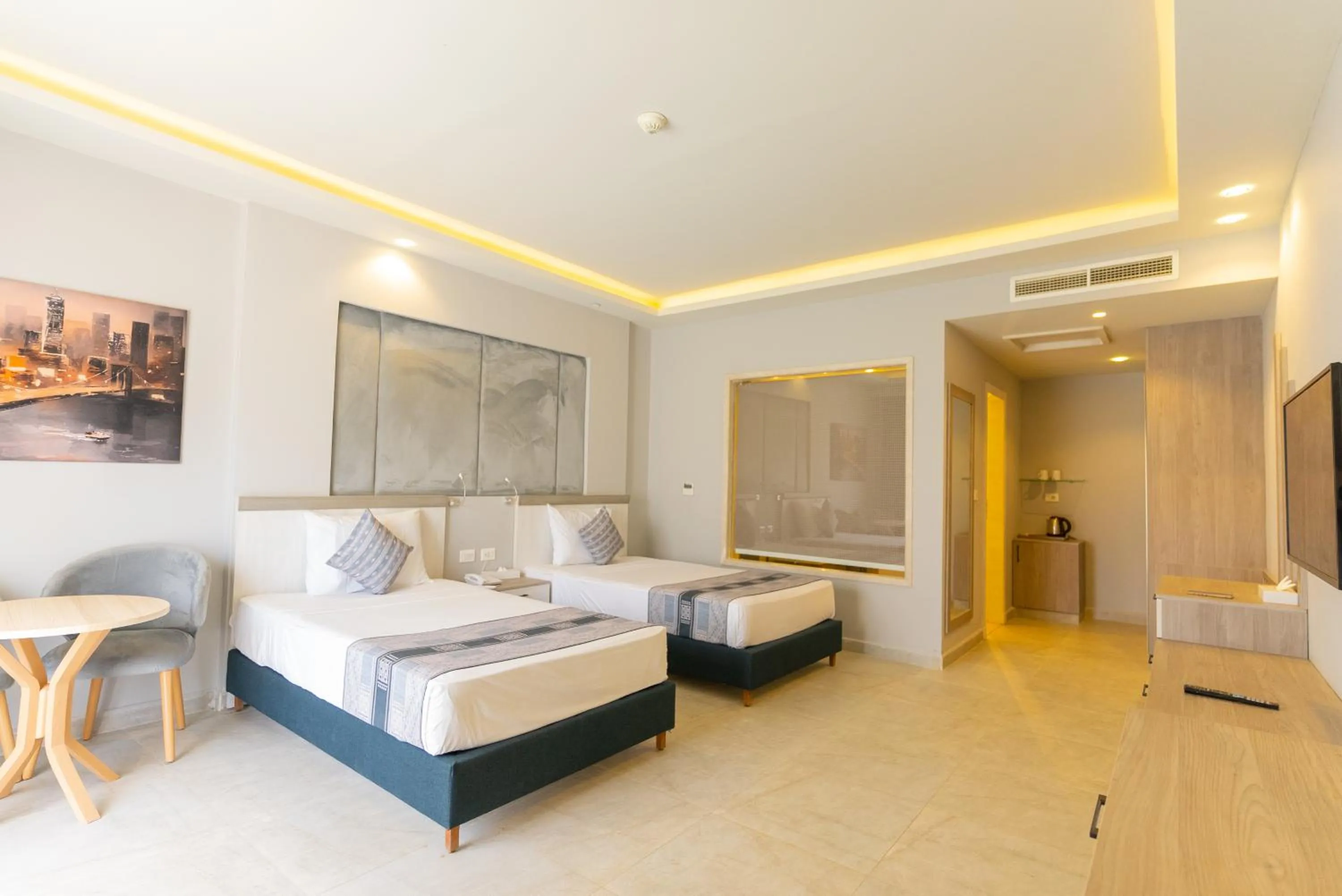 Photo of the whole room, Bed in Aladdin Beach Resort