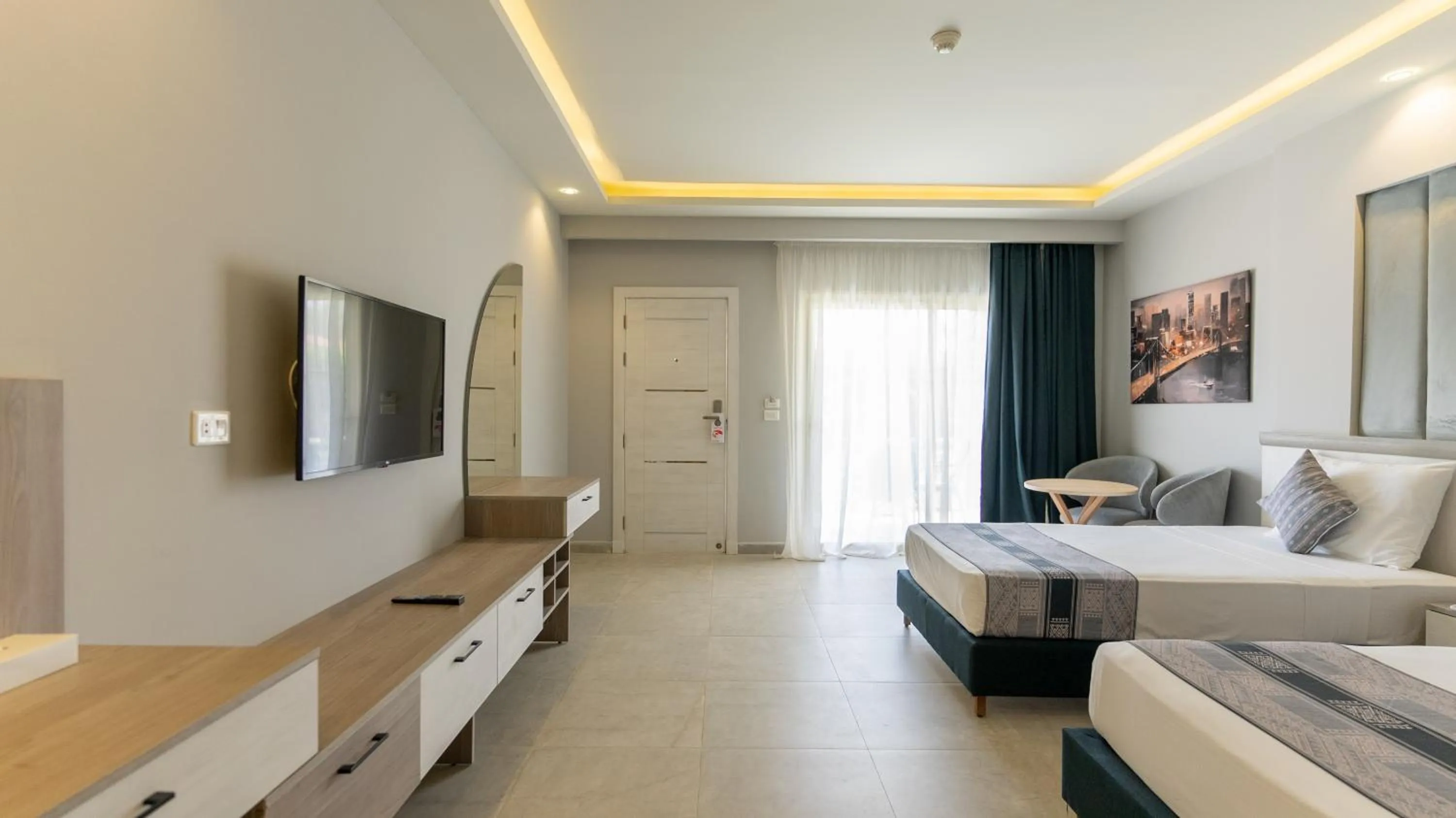 Photo of the whole room, Bed in Aladdin Beach Resort