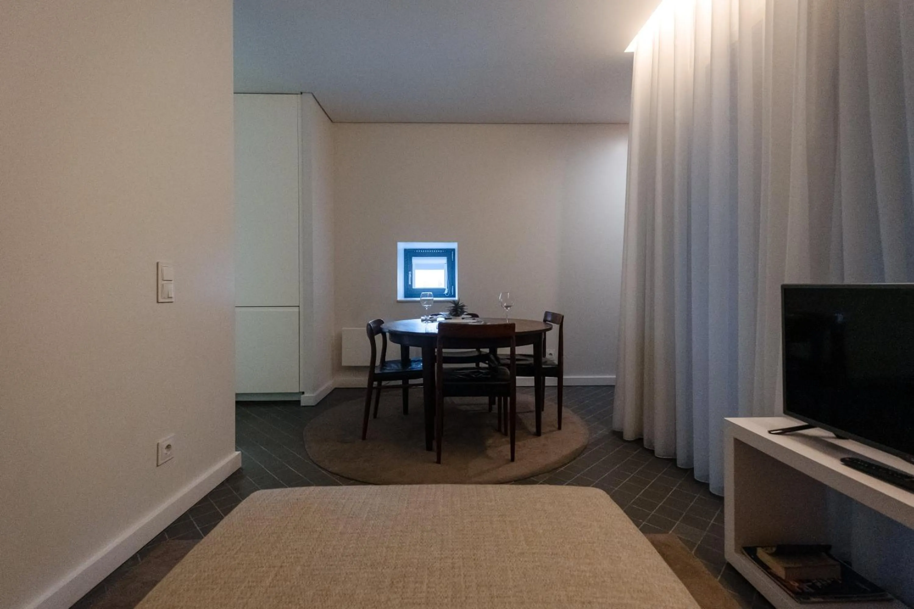 Seating area, Bed in Domum