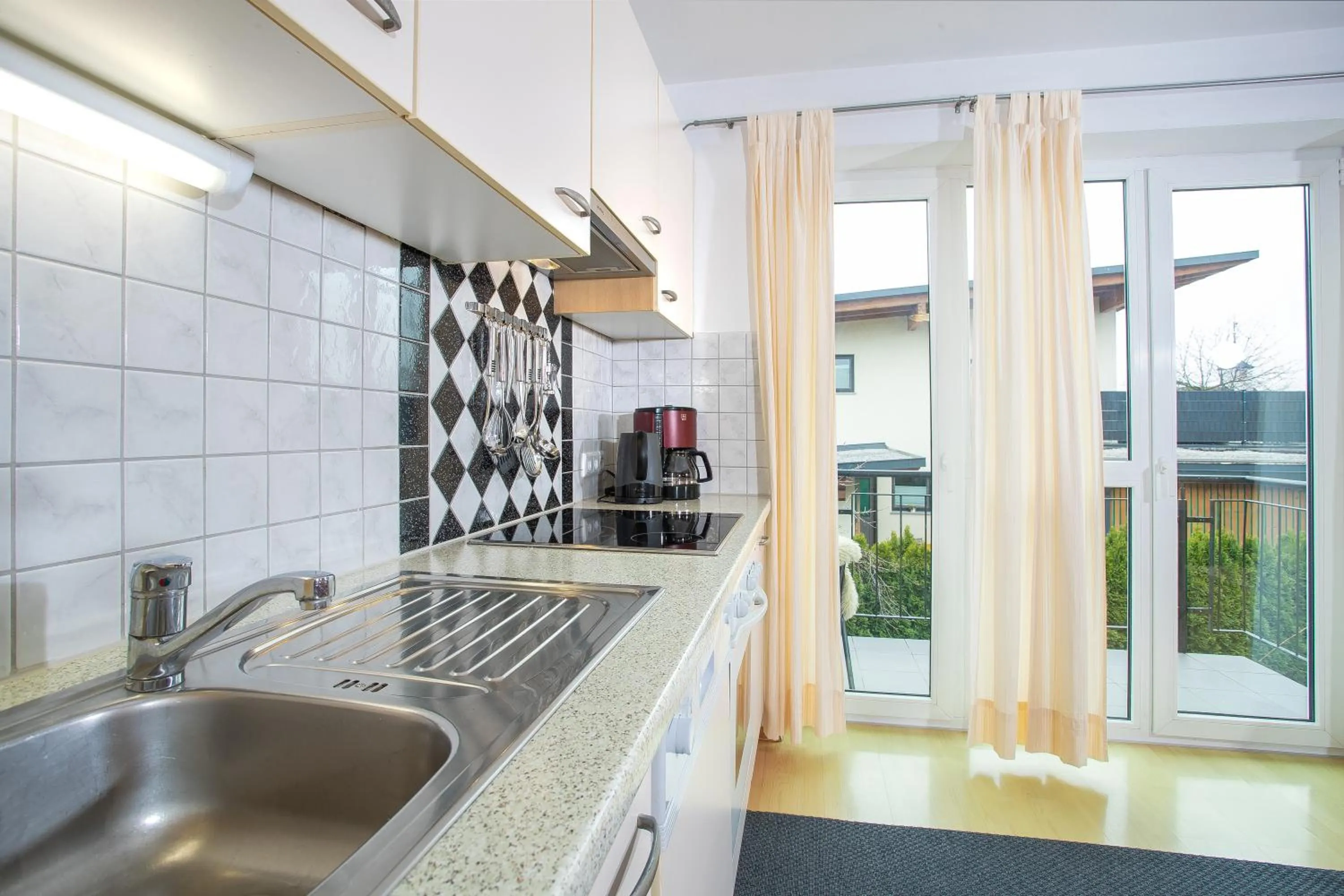 Kitchen or kitchenette in Zillertal Appartements