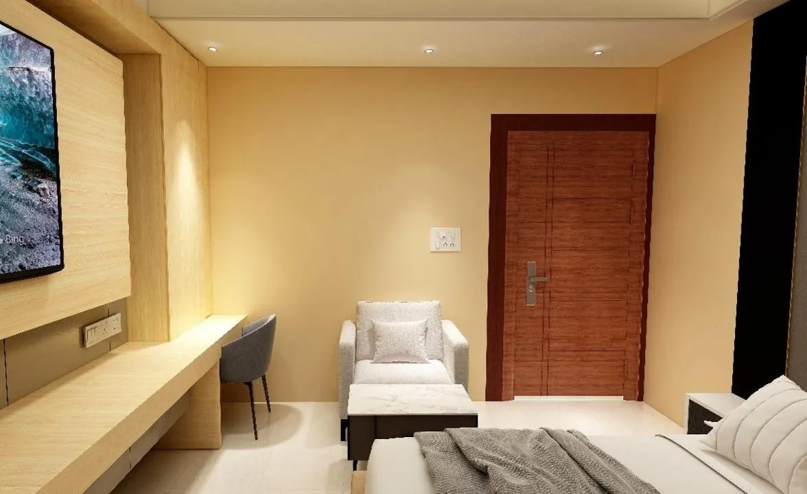 Communal lounge/ TV room, Bed in Hotel Golden Continental