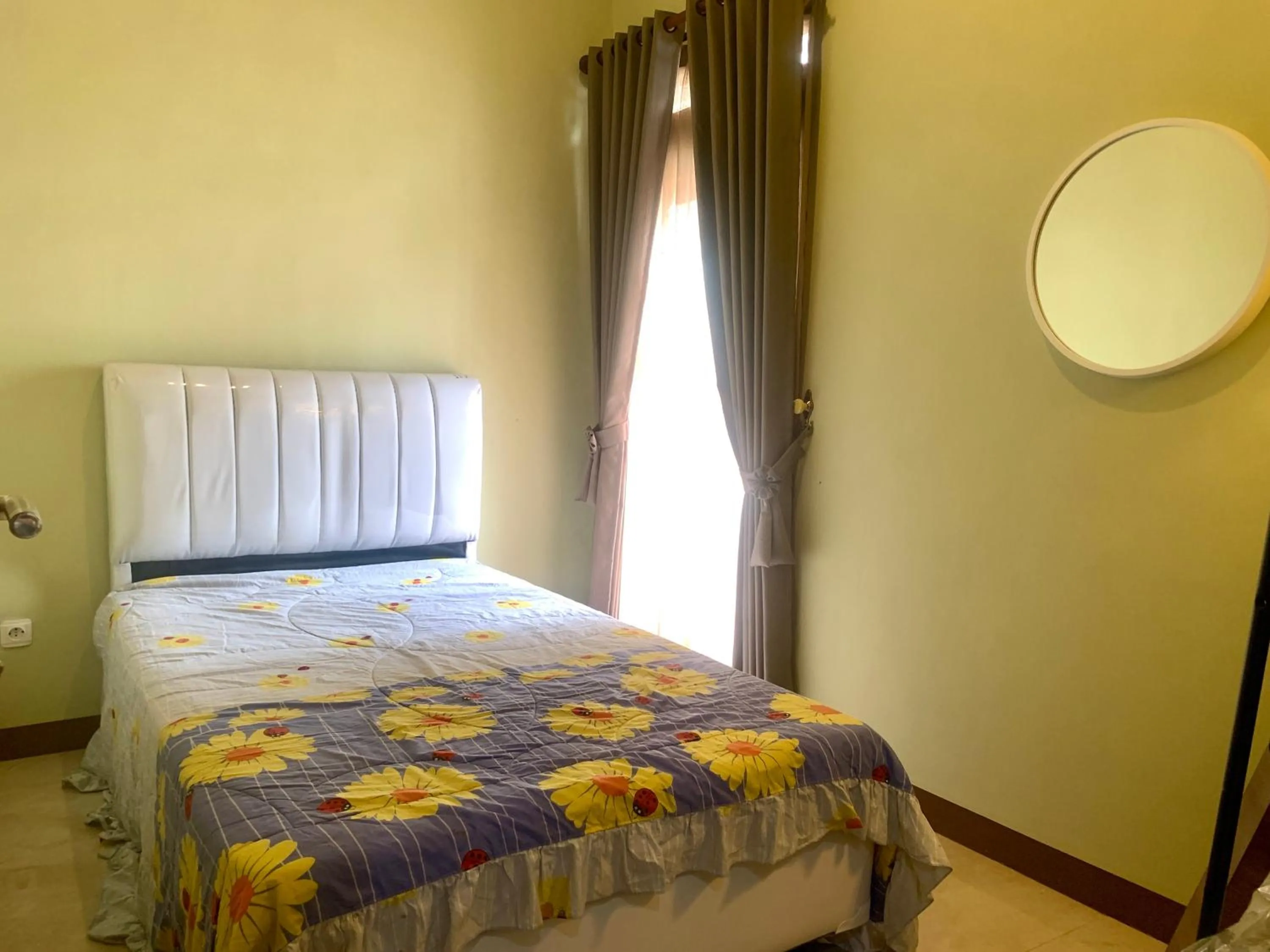 Bed in Blezz Villa Nirwana Tasik