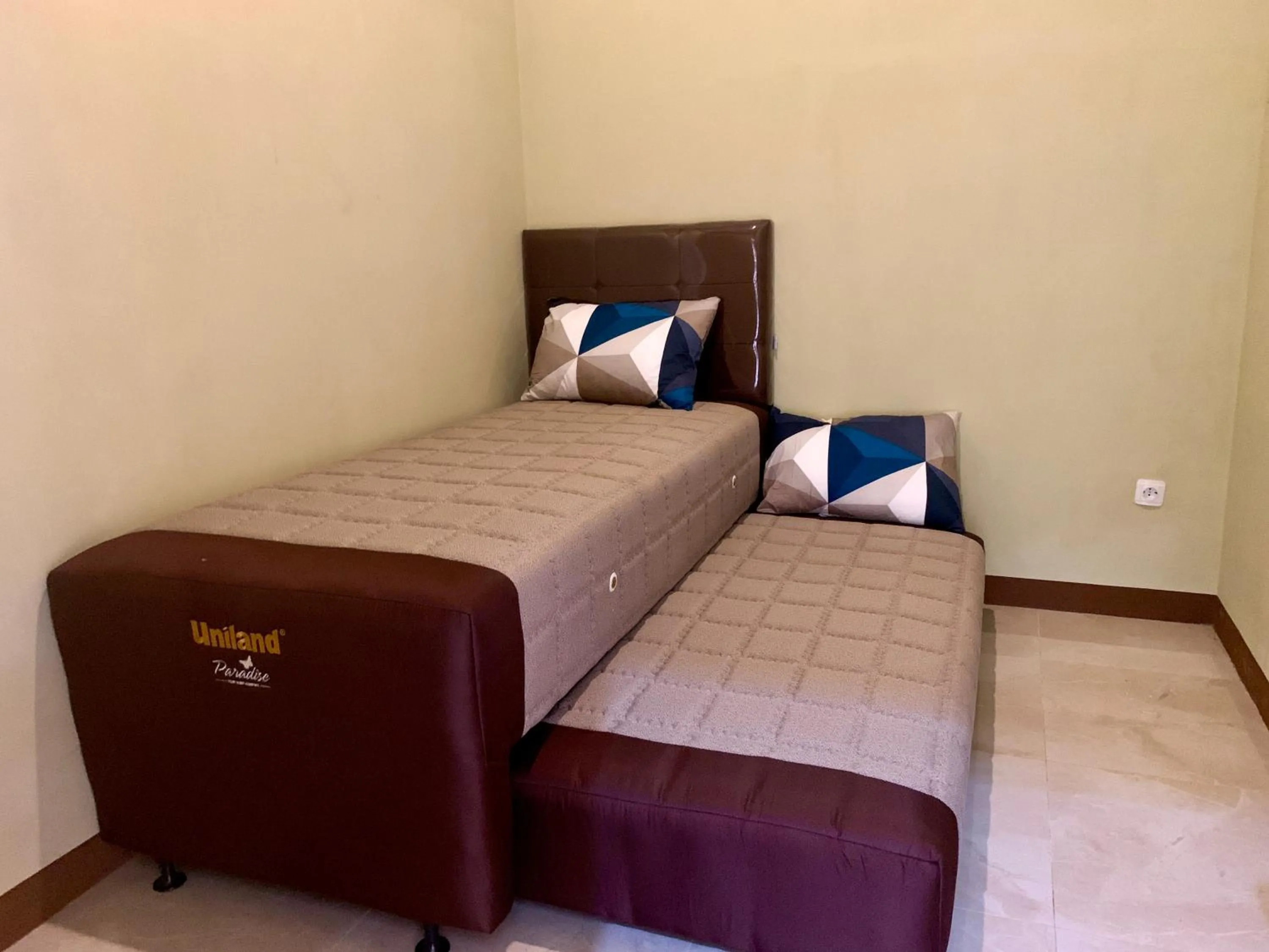 Bed in Blezz Villa Nirwana Tasik