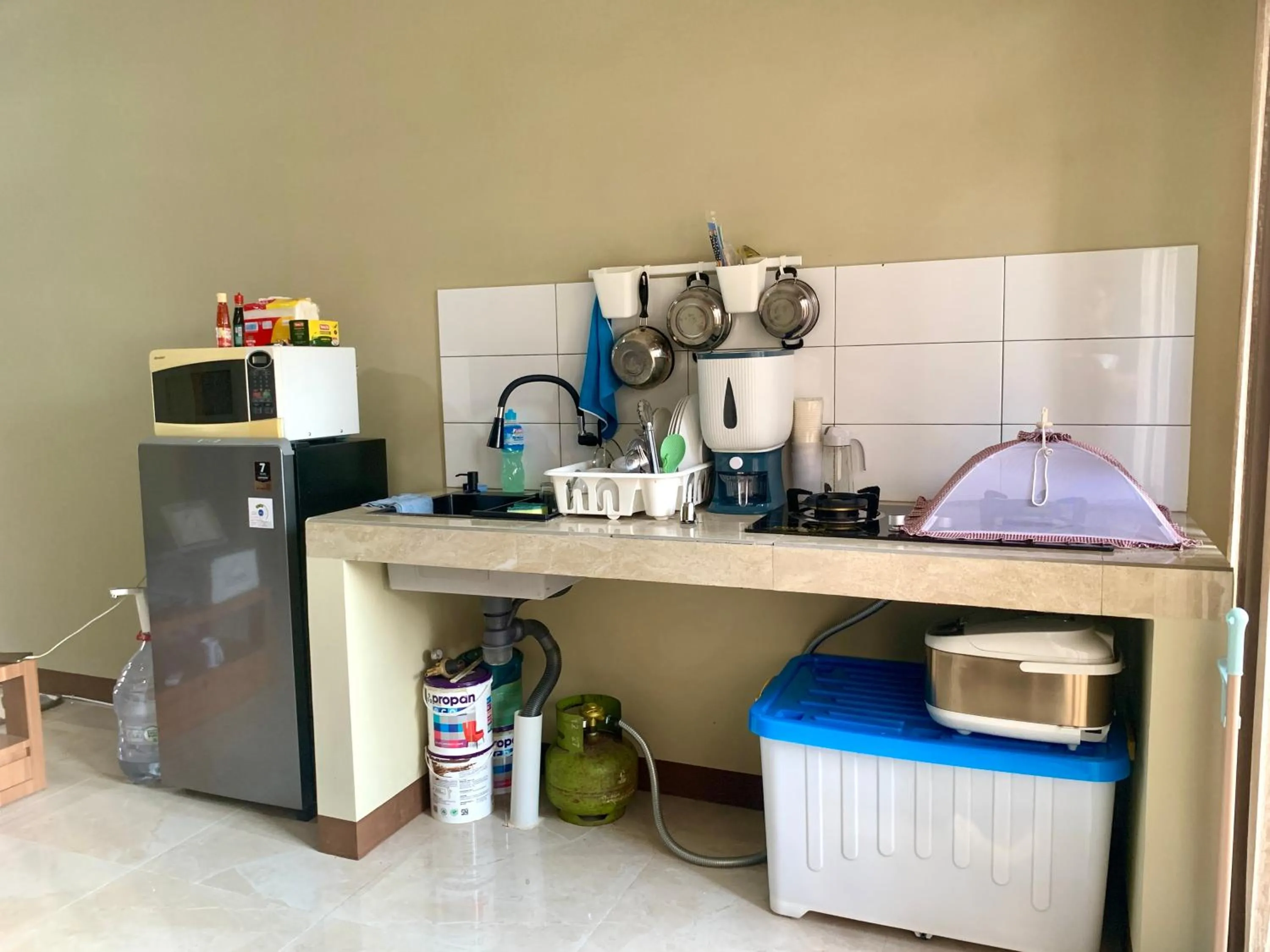 Kitchen or kitchenette in Blezz Villa Nirwana Tasik