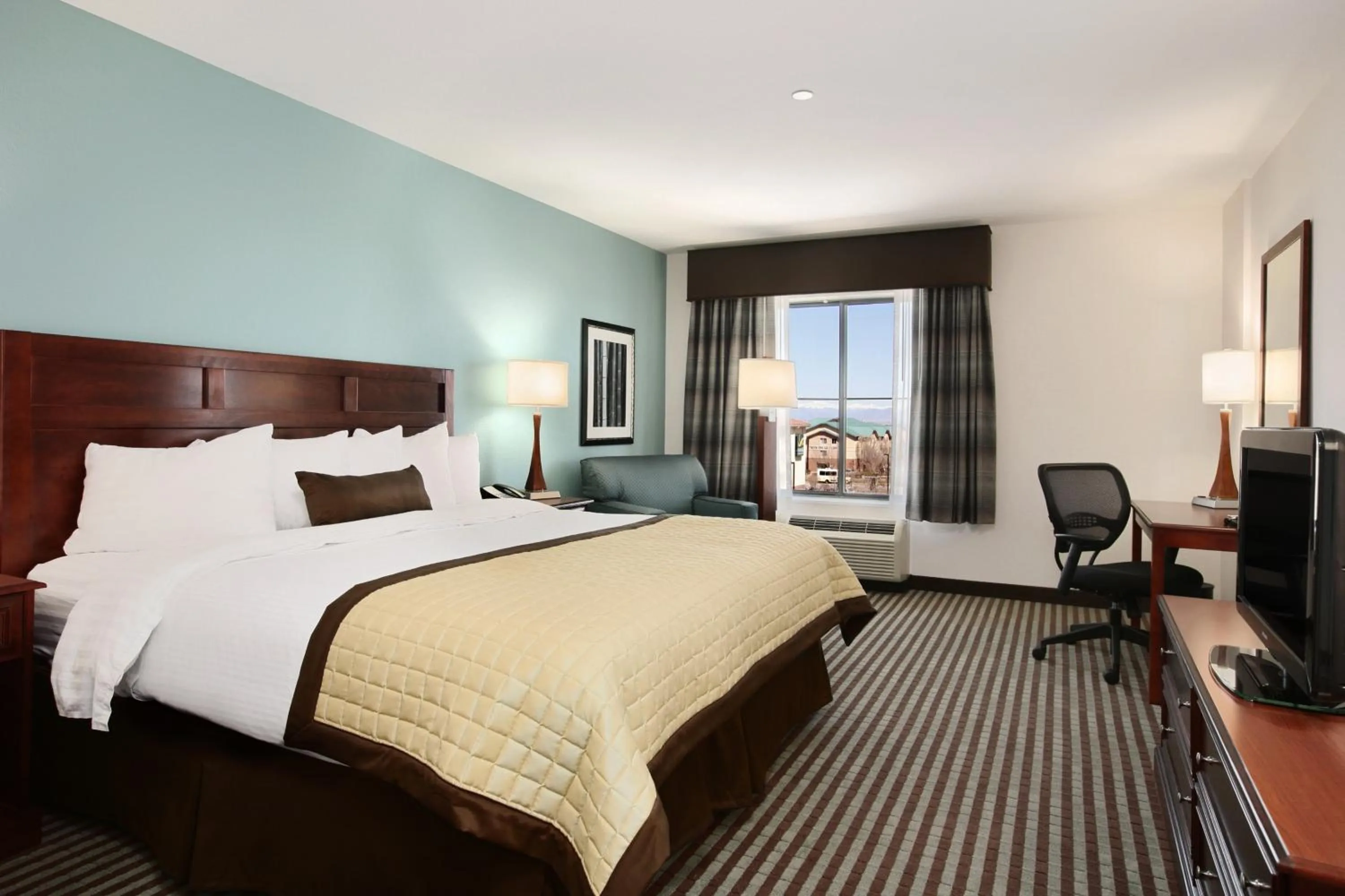 Photo of the whole room, Bed in Baymont by Wyndham Denver International Airport