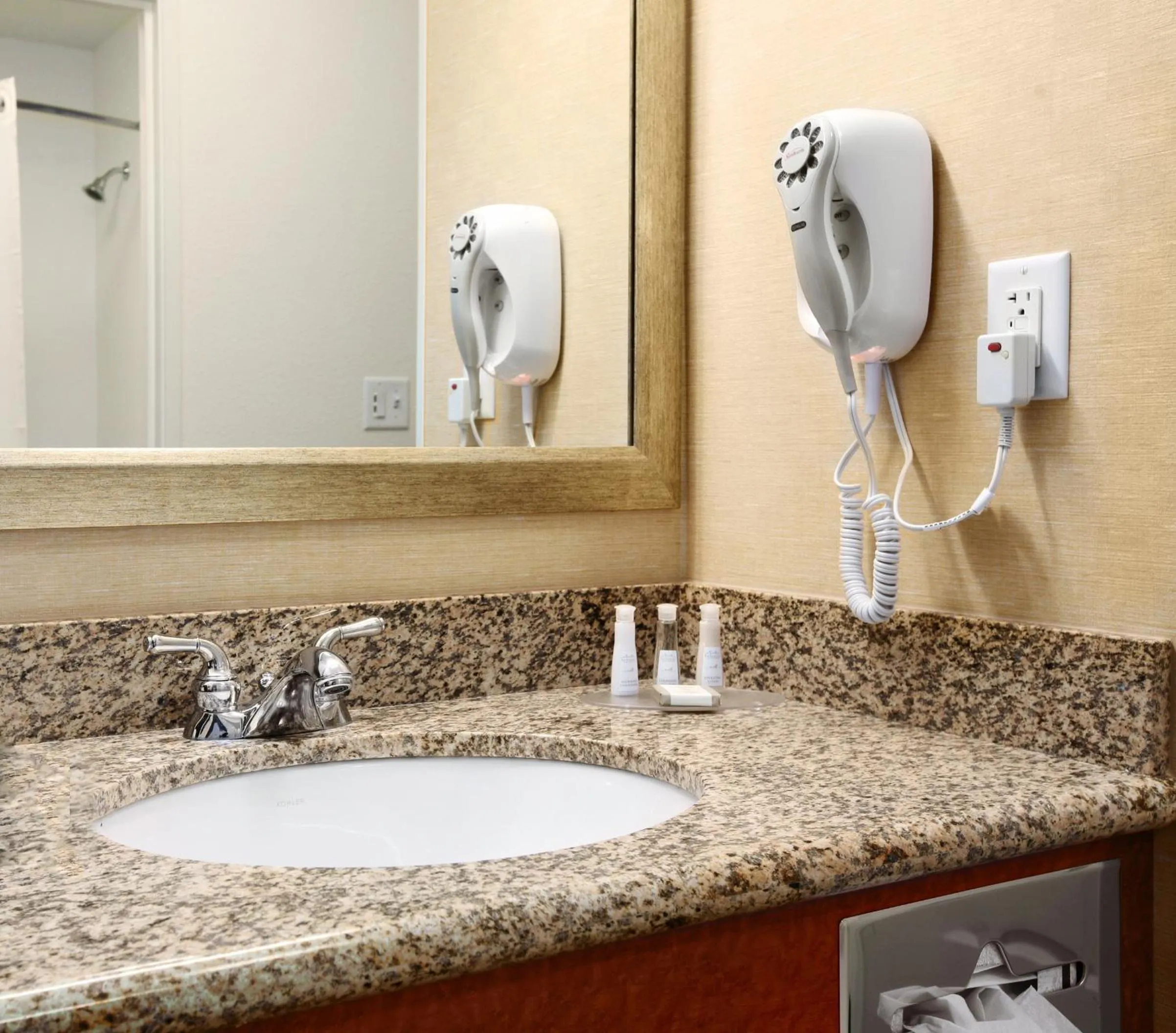 Bathroom in Baymont by Wyndham Denver International Airport