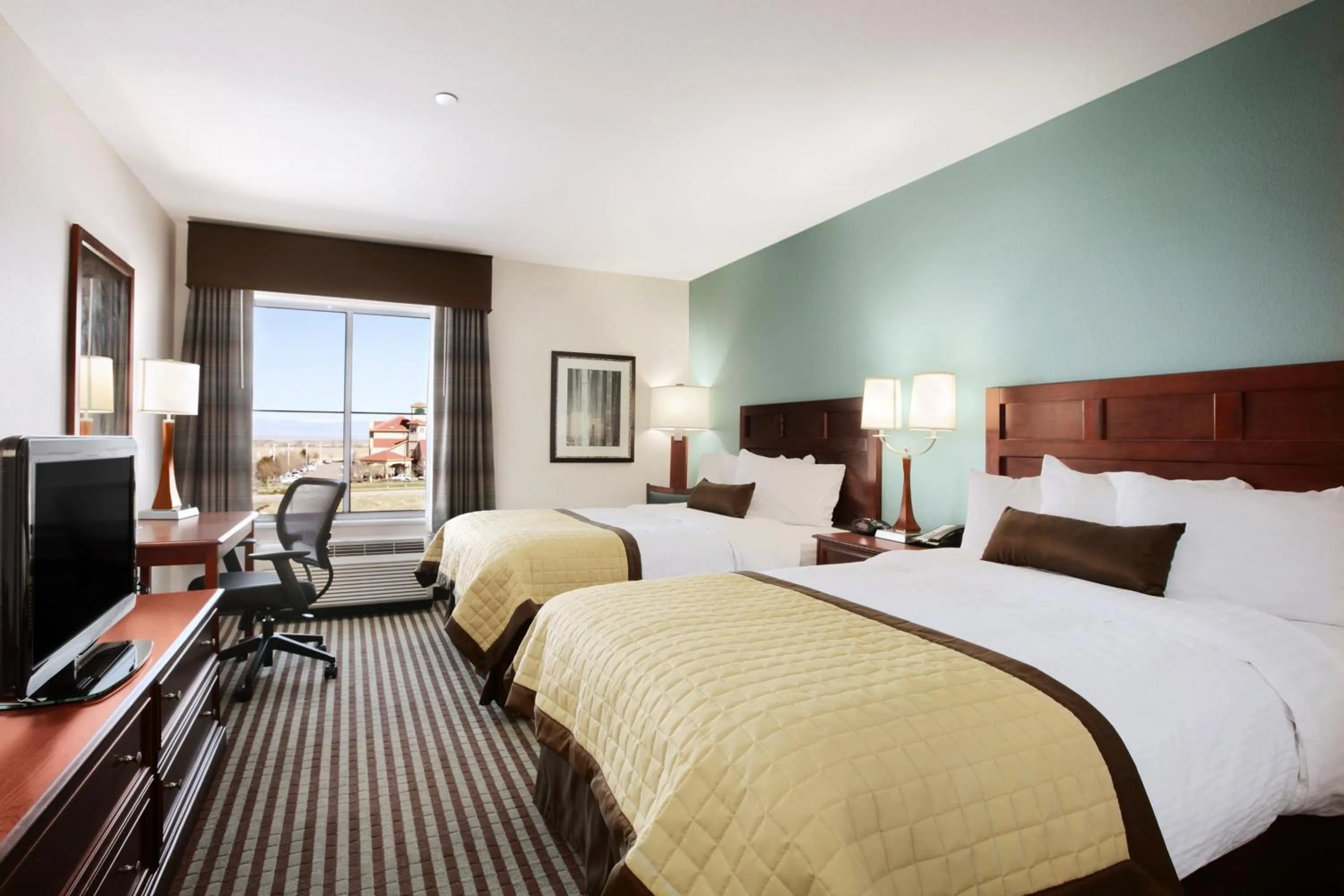 Photo of the whole room, Bed in Baymont by Wyndham Denver International Airport