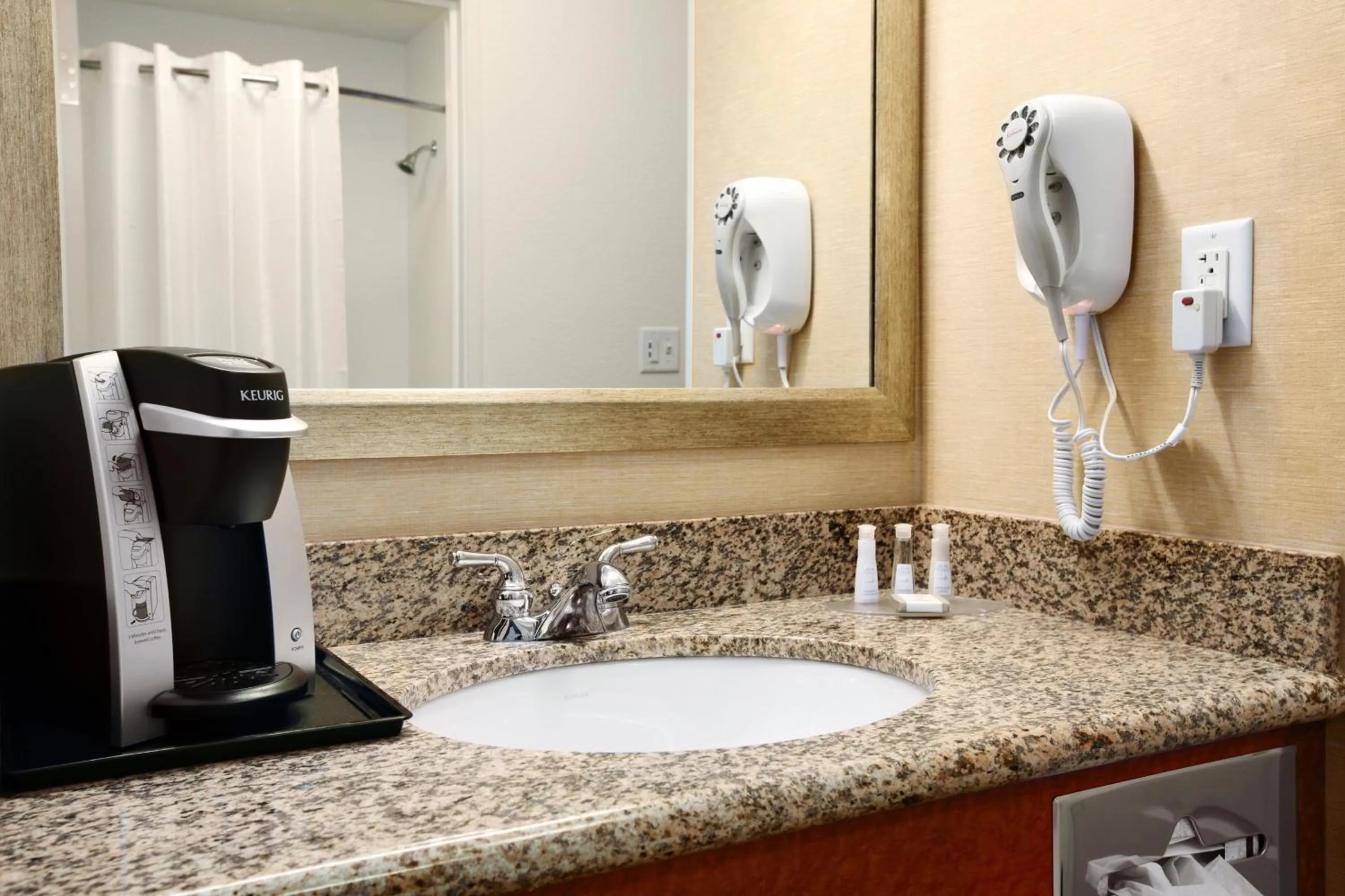 Bathroom in Baymont by Wyndham Denver International Airport