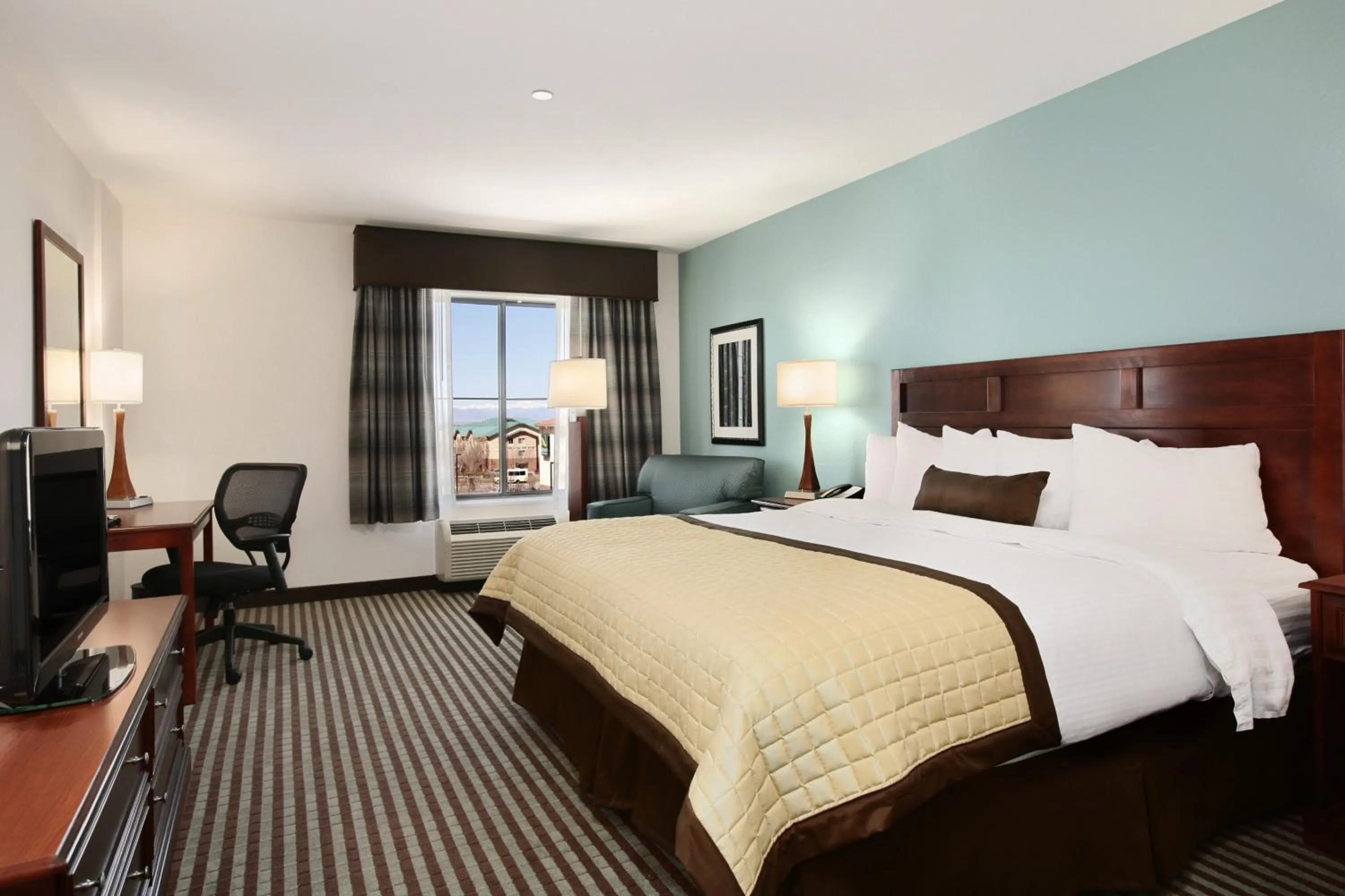 Photo of the whole room, Bed in Baymont by Wyndham Denver International Airport
