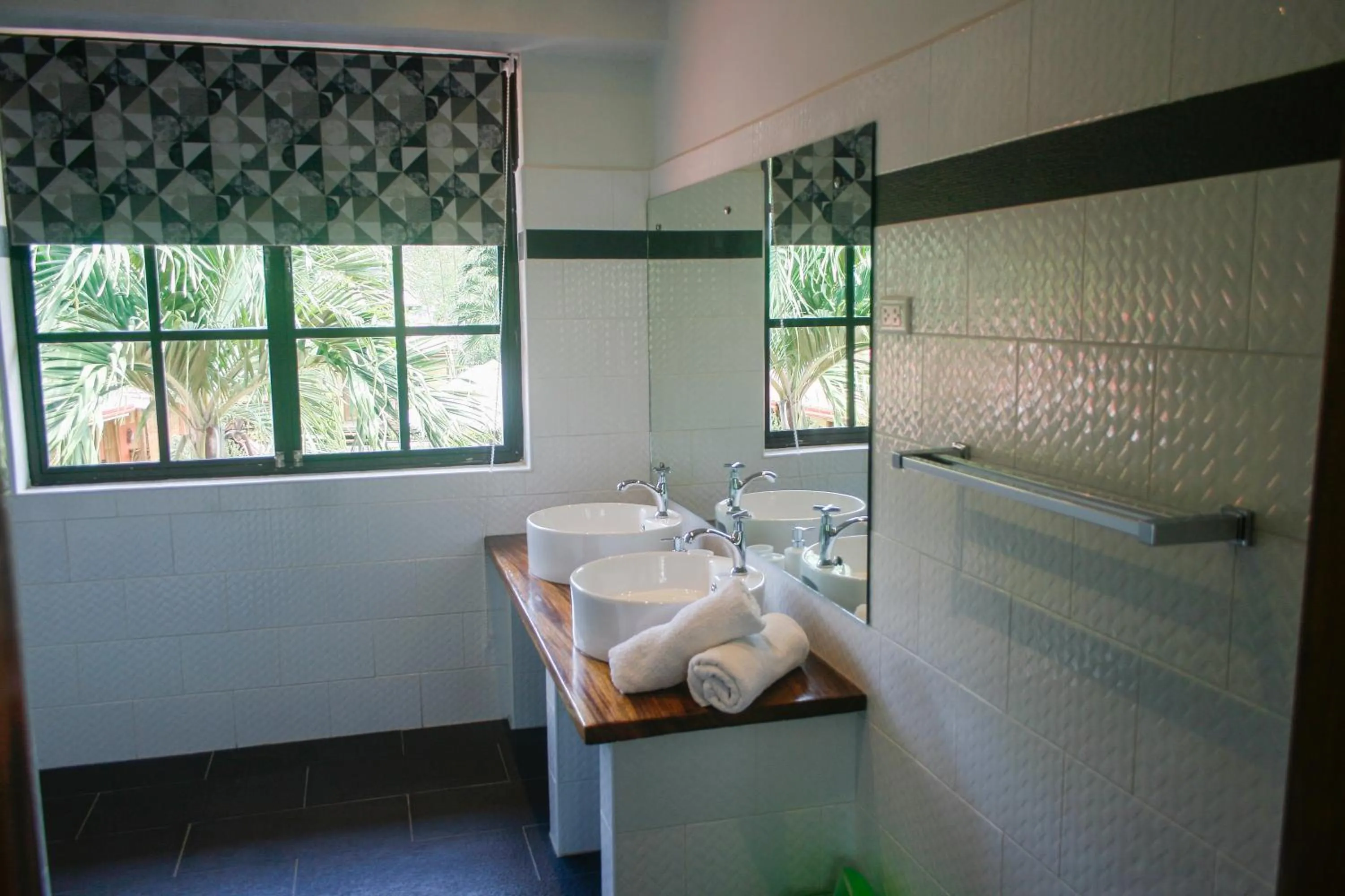 Shower in Isla Hayahay Beach Resort and Restaurant