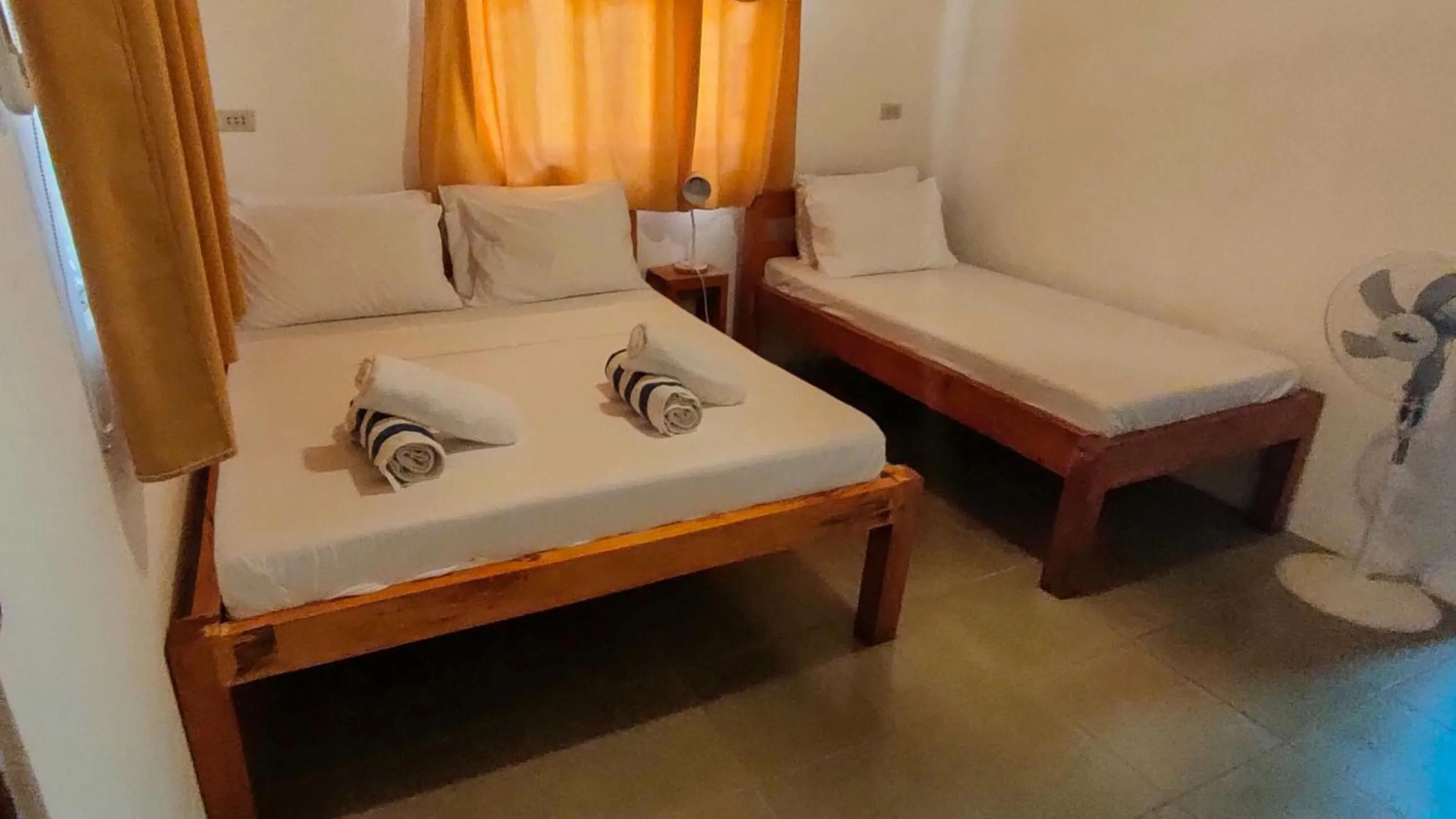 Bed in Isla Hayahay Beach Resort and Restaurant