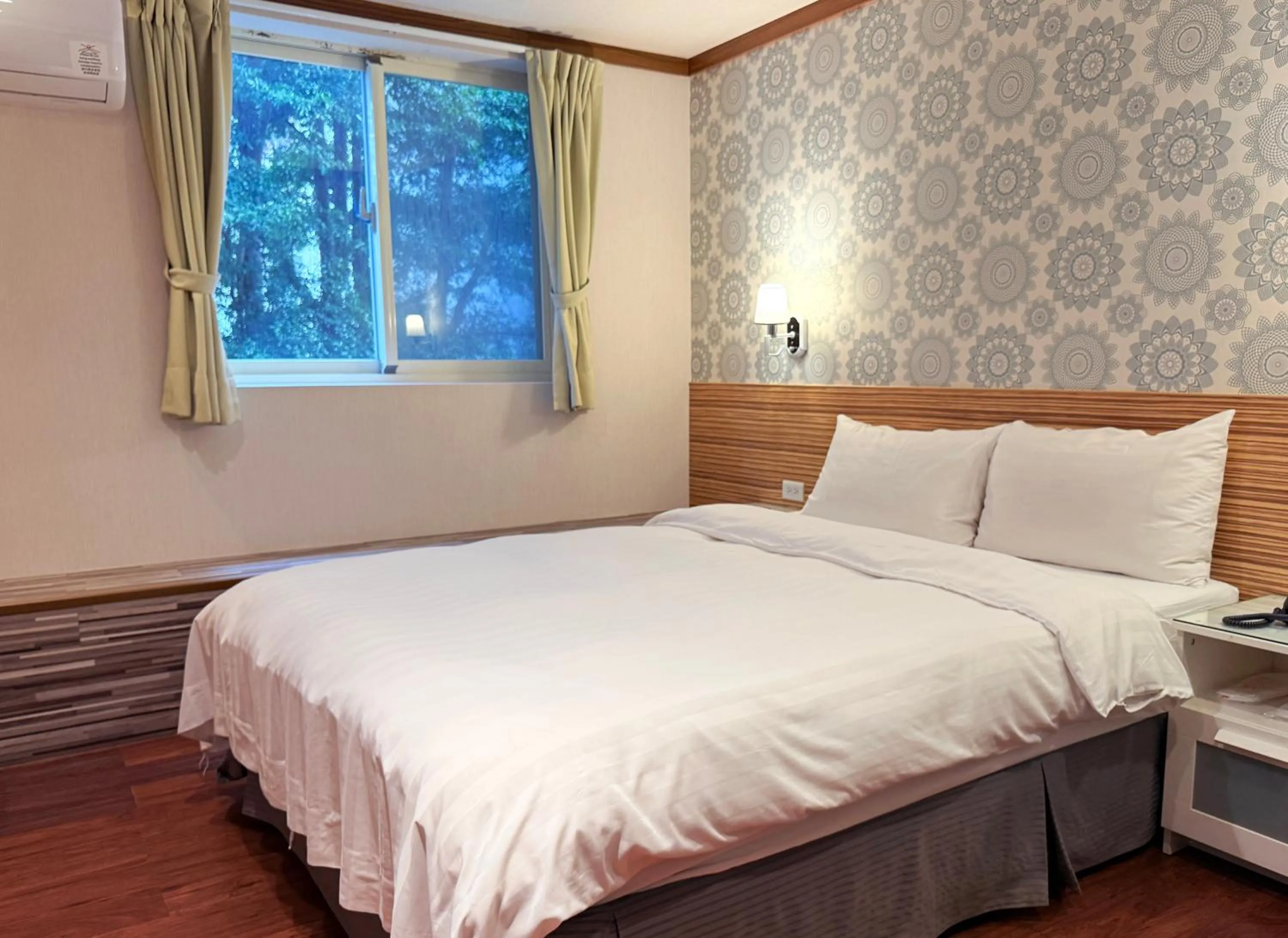 Bed in 泊居旅店 Oursinn Hotel