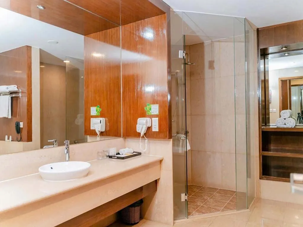 Bathroom in AURORA Hotel Plaza