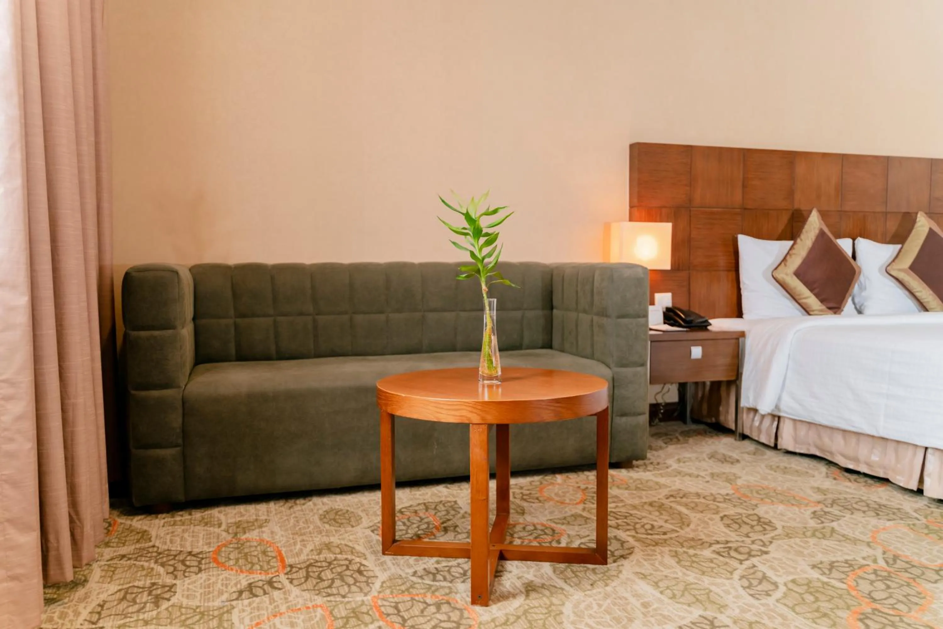 Bed in AURORA Hotel Plaza